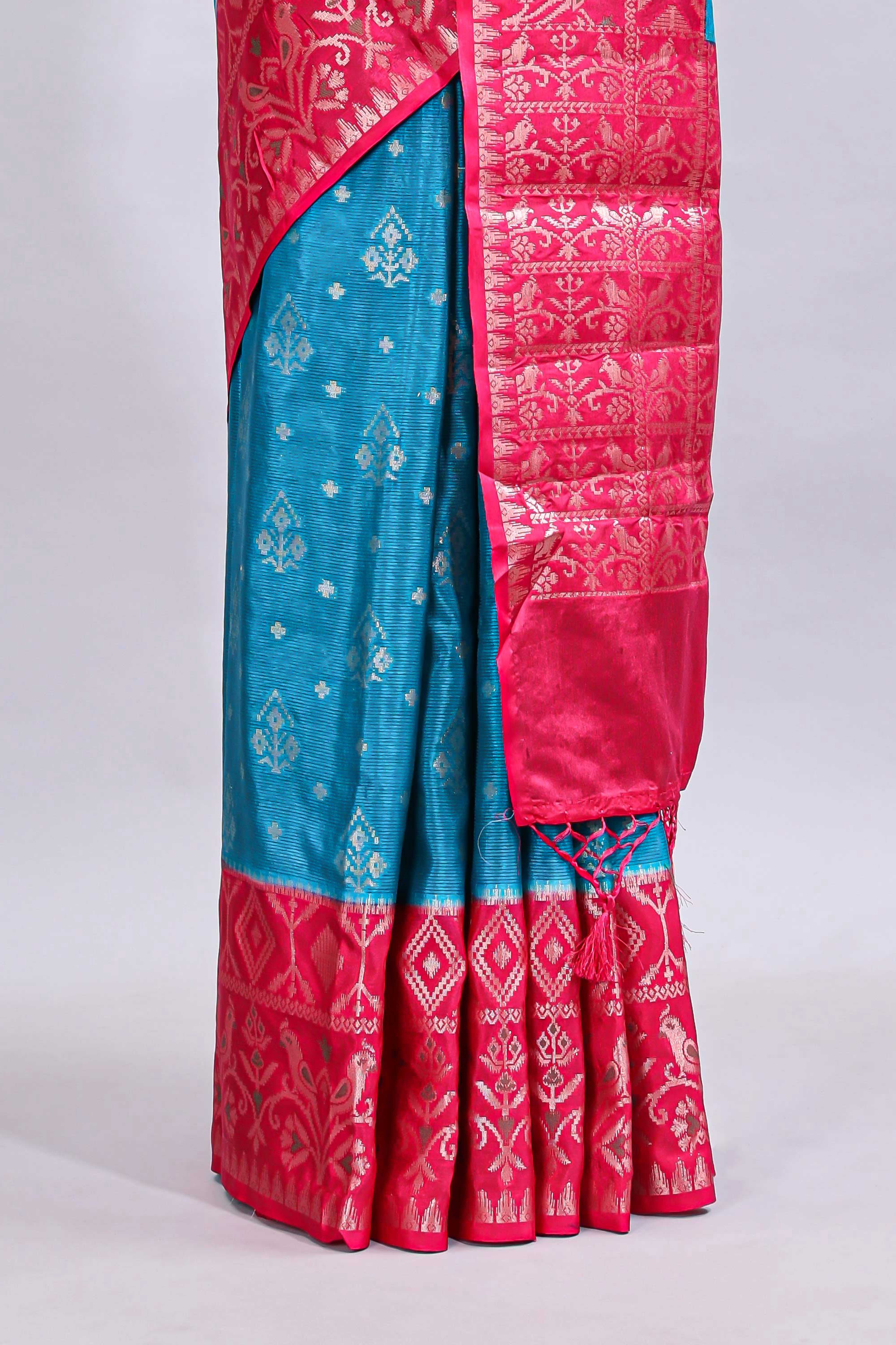 Blue floral design mushru silk saree with contrast border and zari blouse
