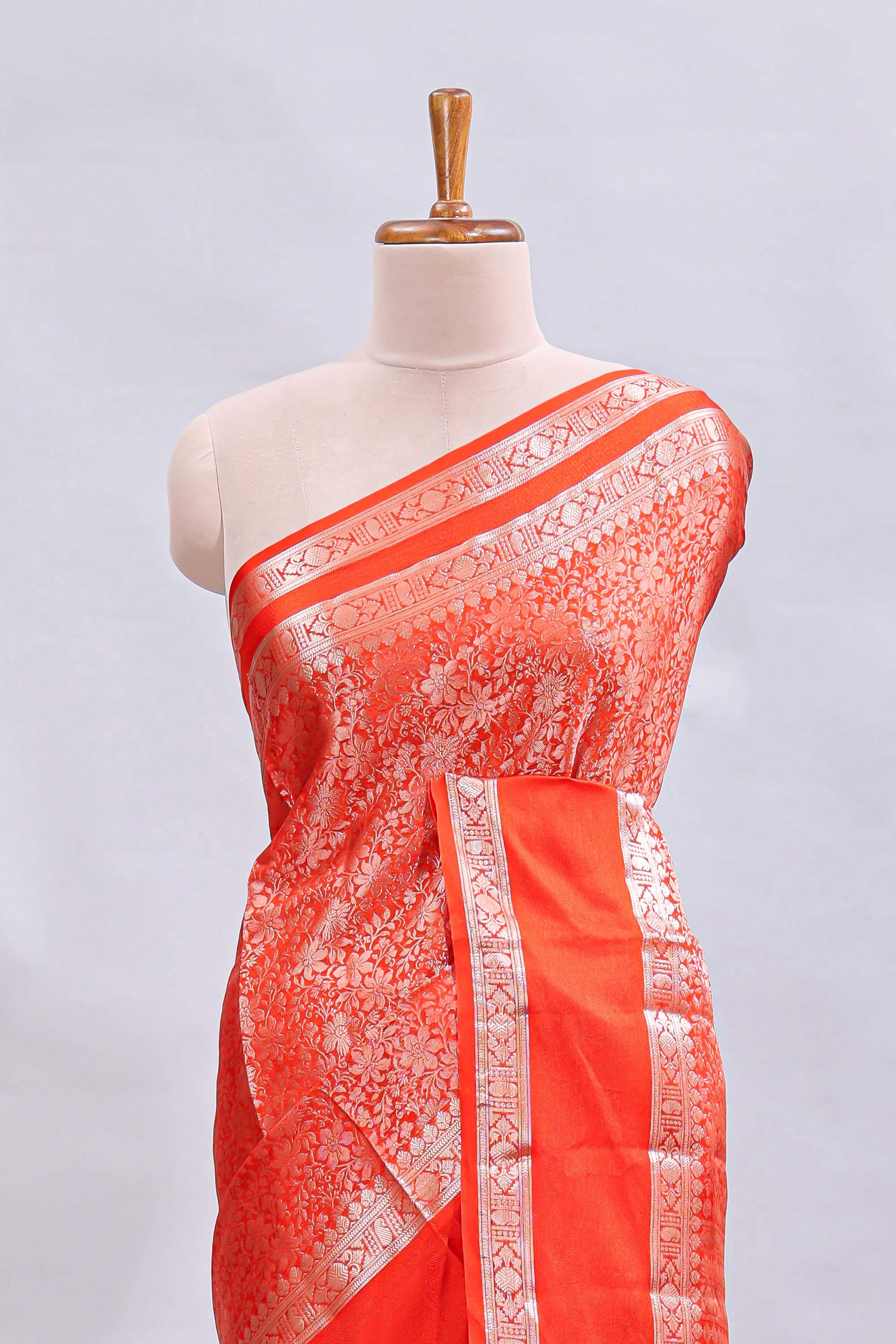 Orange jaal floral design mushru silk saree with self border and matching blouse
