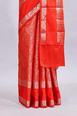 Orange jaal floral design mushru silk saree with self border and matching blouse