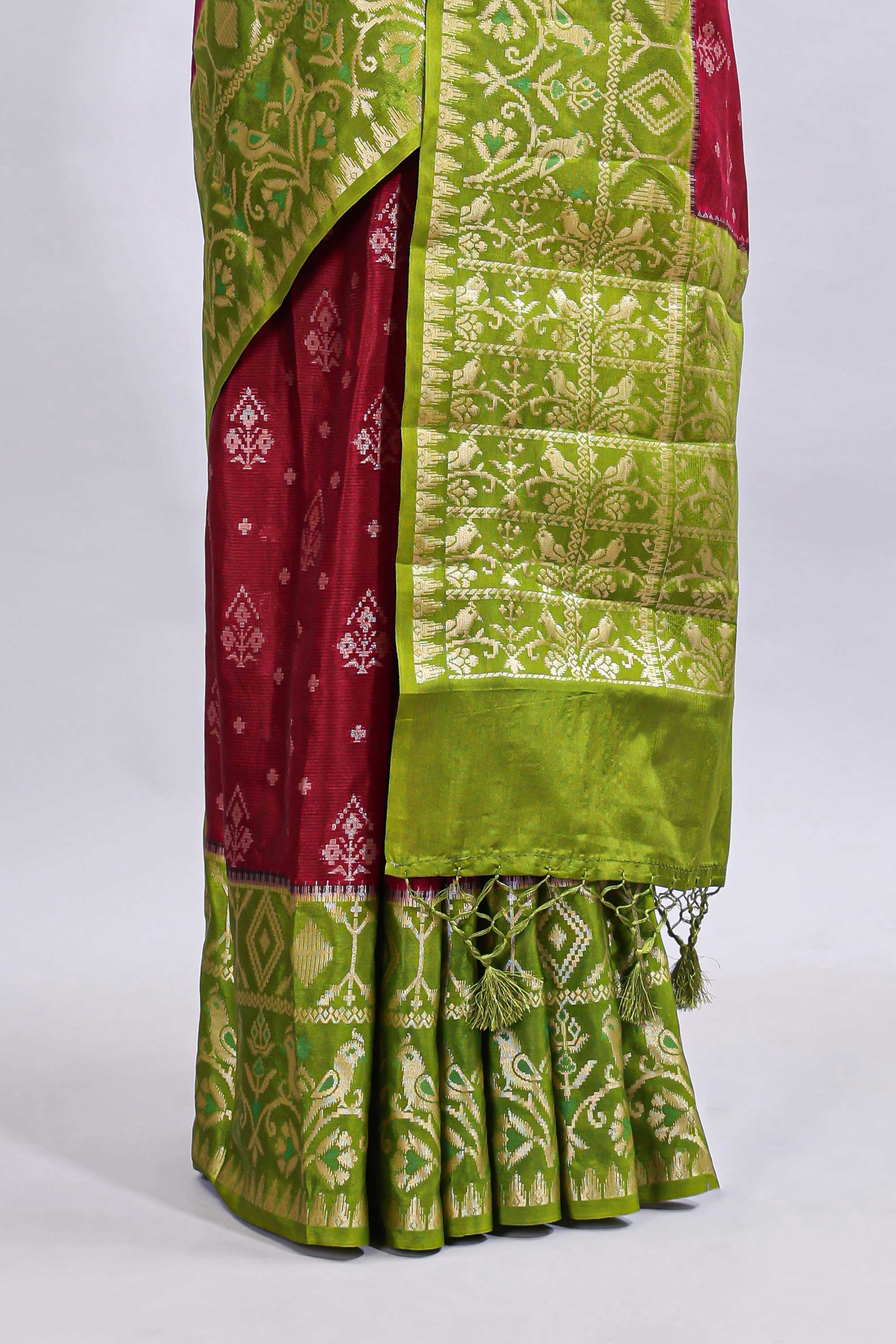 Maroon floral design mushru silk saree with contrast border and zari blouse