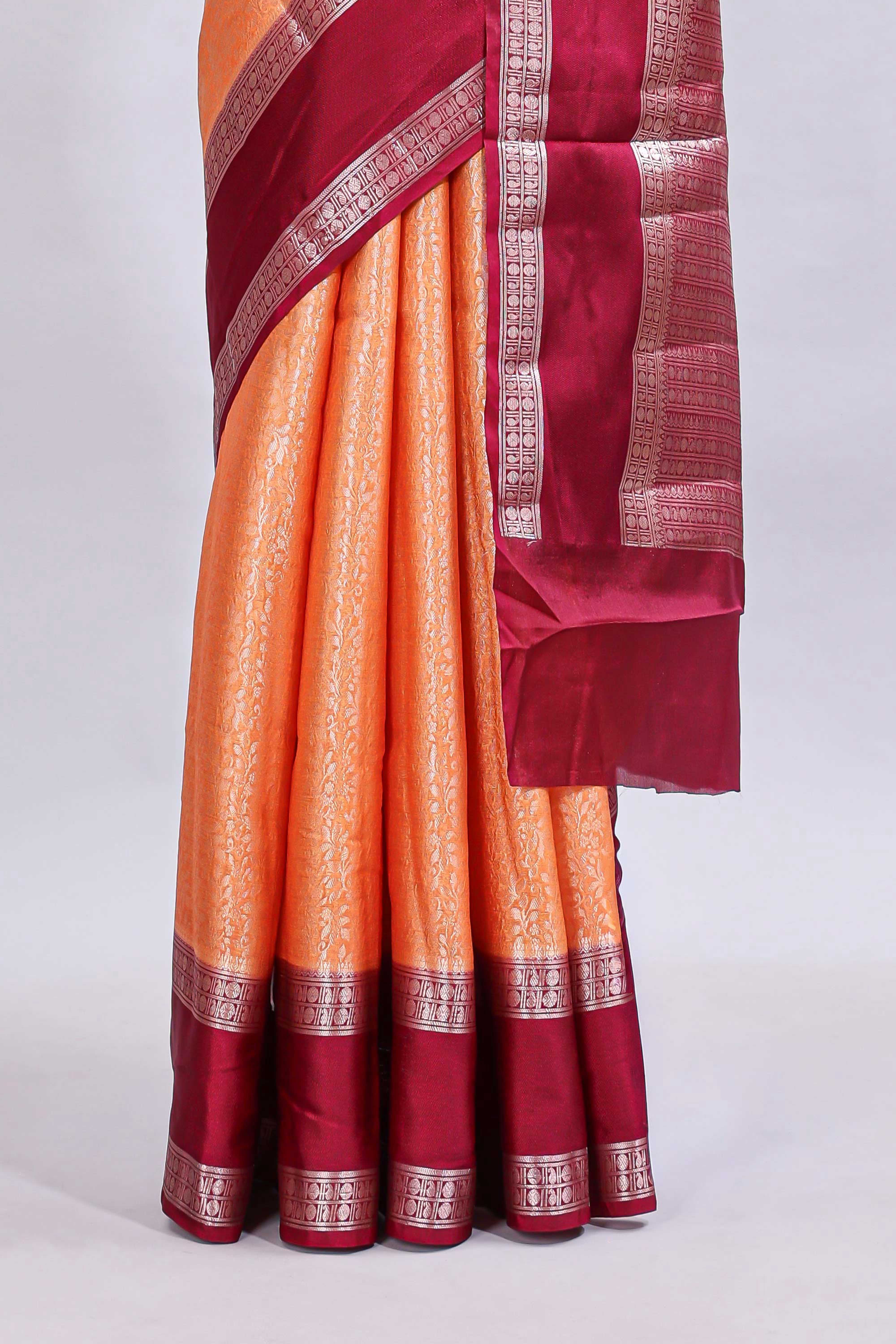 Orange jaal floral design mushru silk saree with contrast border and contrast blouse