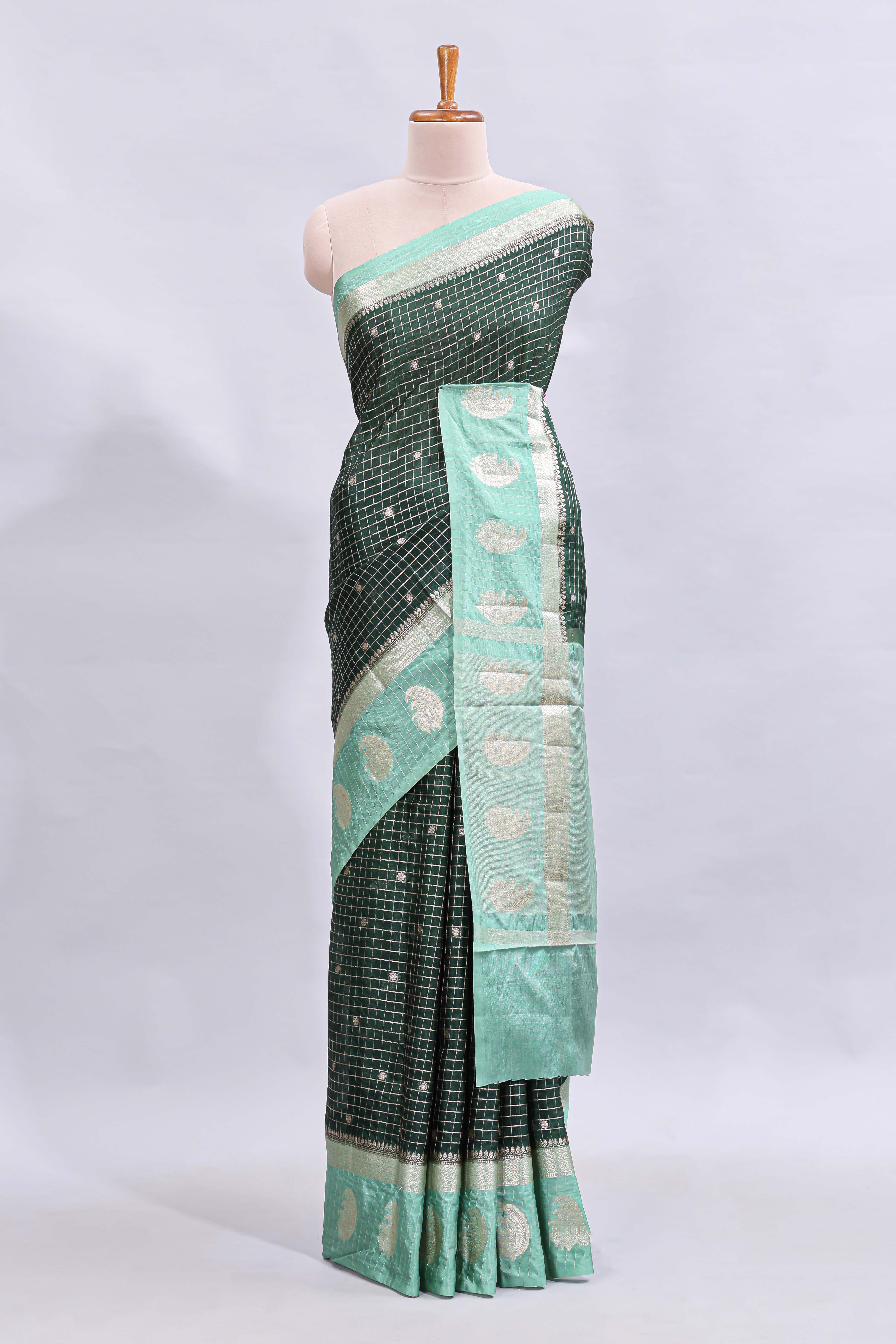 Green checked floral motifs design mushru silk saree with contrast border and blouse