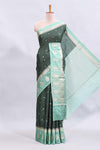 Green checked floral motifs design mushru silk saree with contrast border and blouse