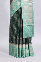 Green checked floral motifs design mushru silk saree with contrast border and blouse