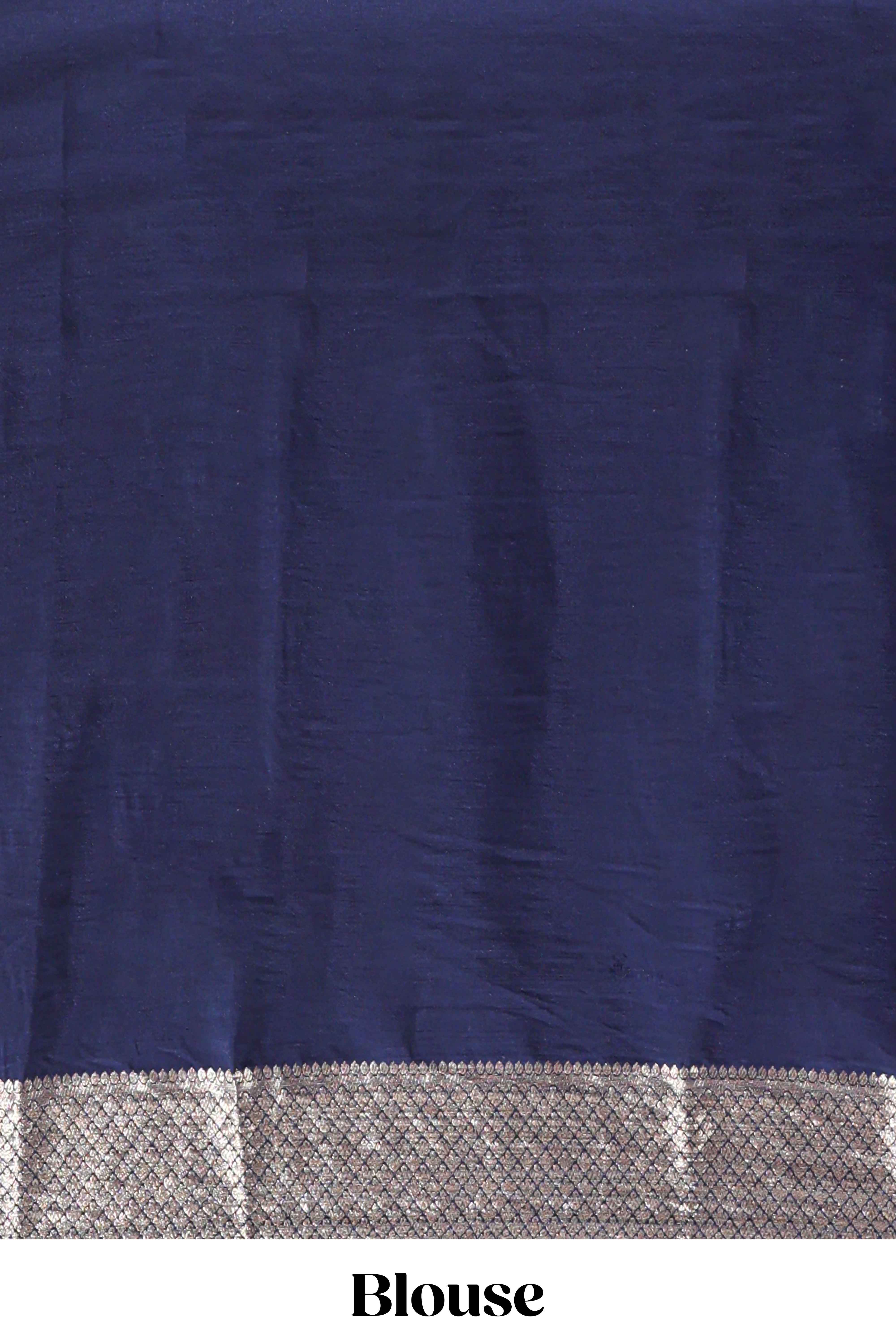 Blue zari design mushru silk saree with contrast striped zari border and blouse