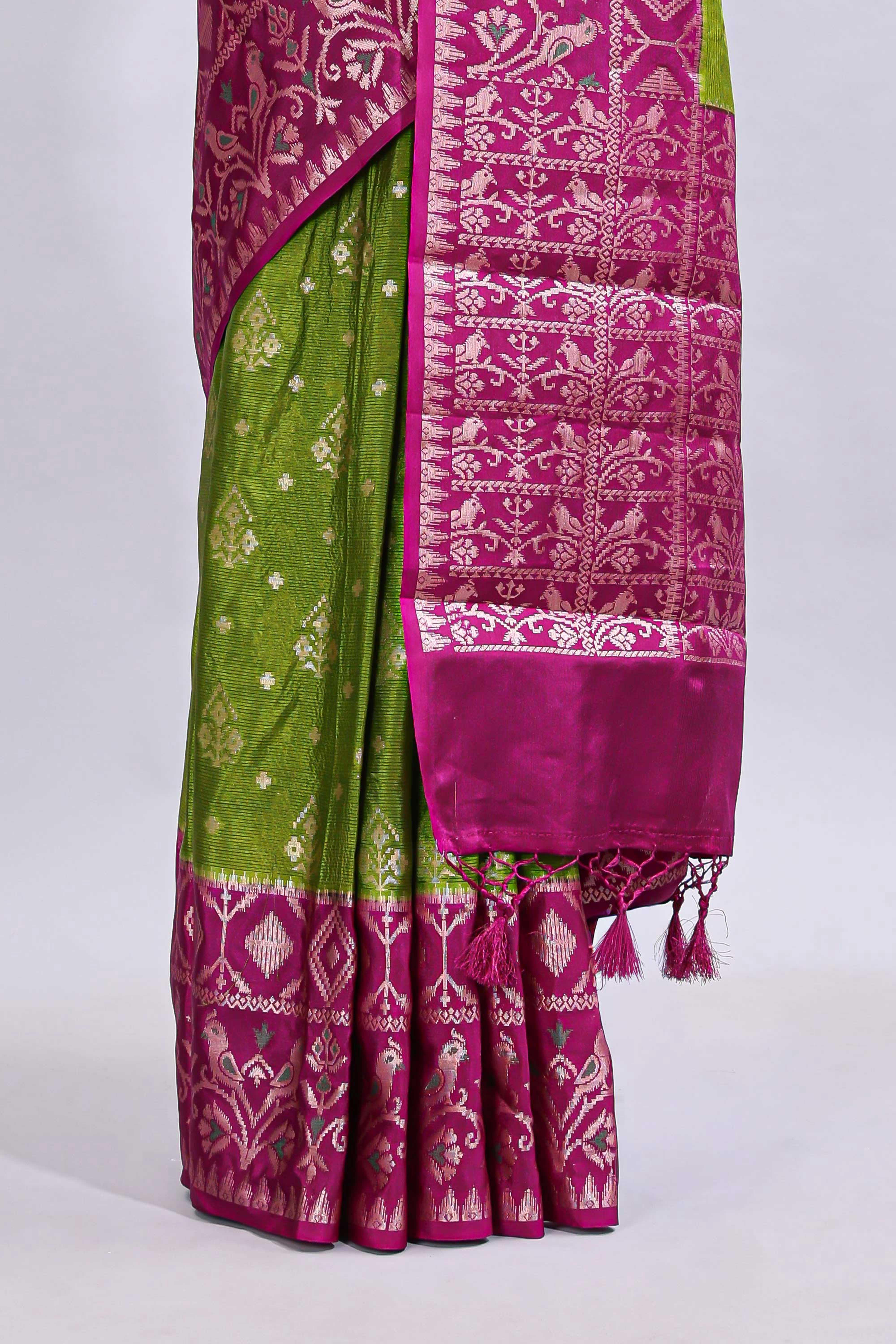 Green floral design mushru silk saree with contrast border and zari blouse