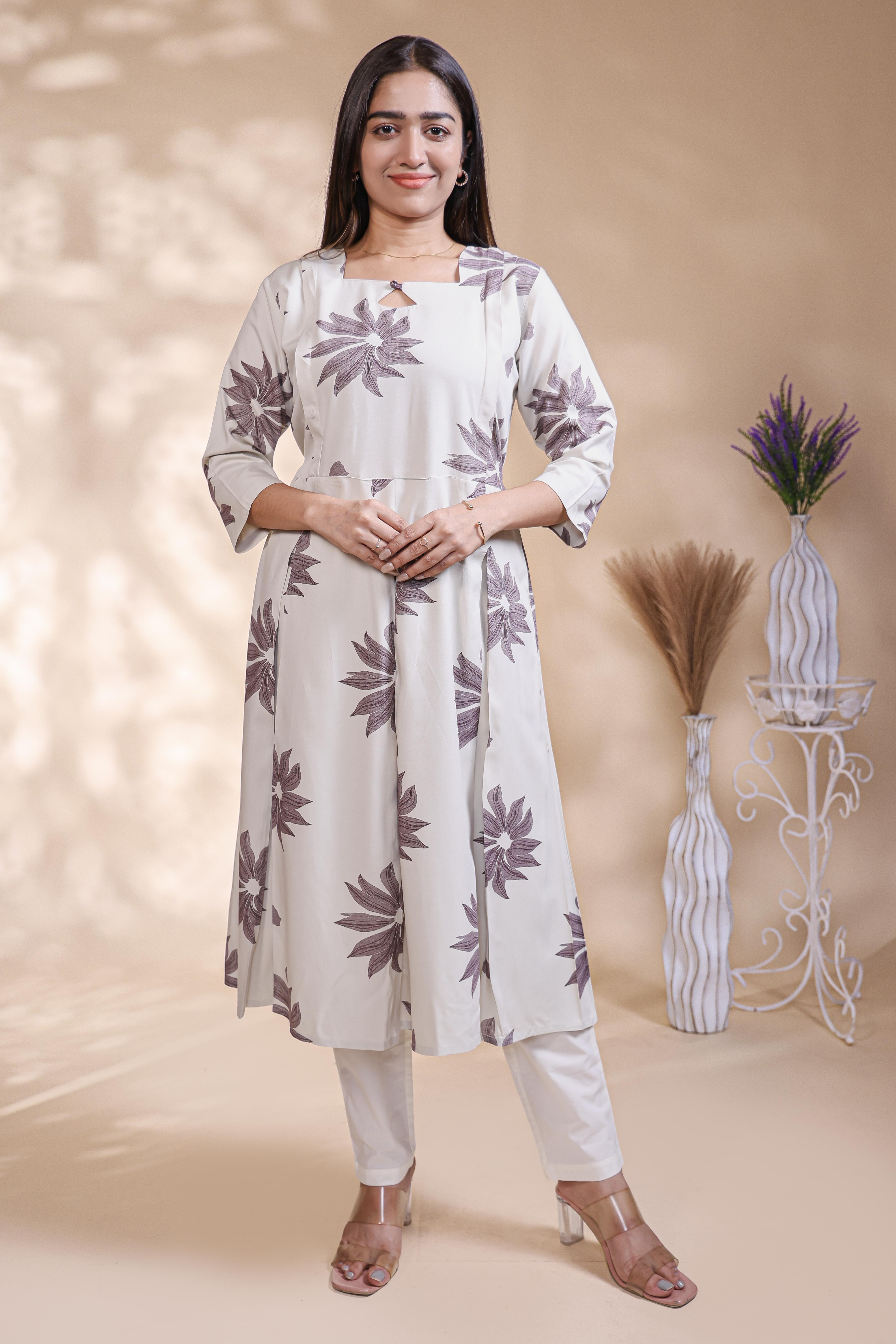 White floral printed A-line maternity wear with 3/4 sleeves and keyhole neck