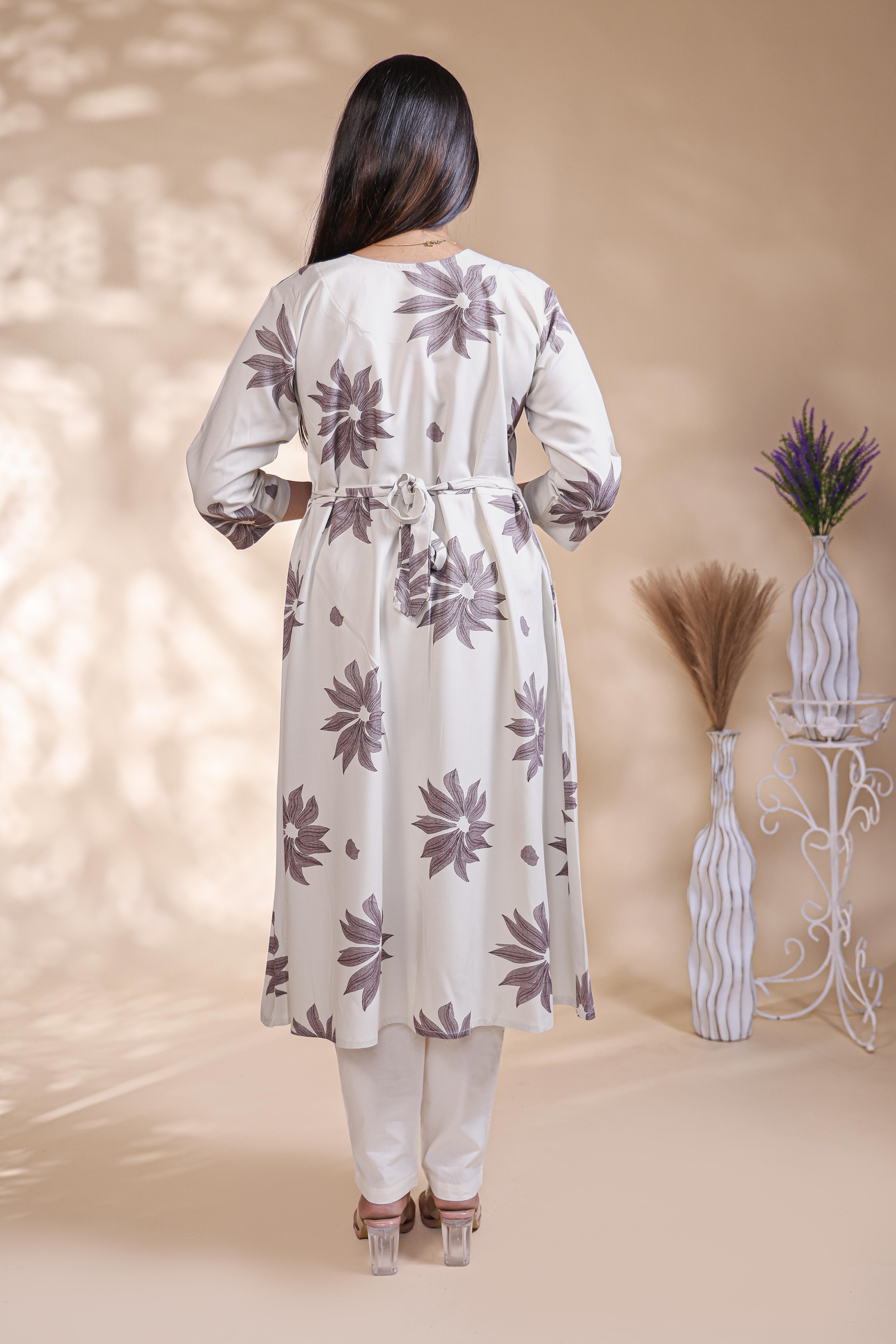 White floral printed A-line maternity wear with 3/4 sleeves and keyhole neck