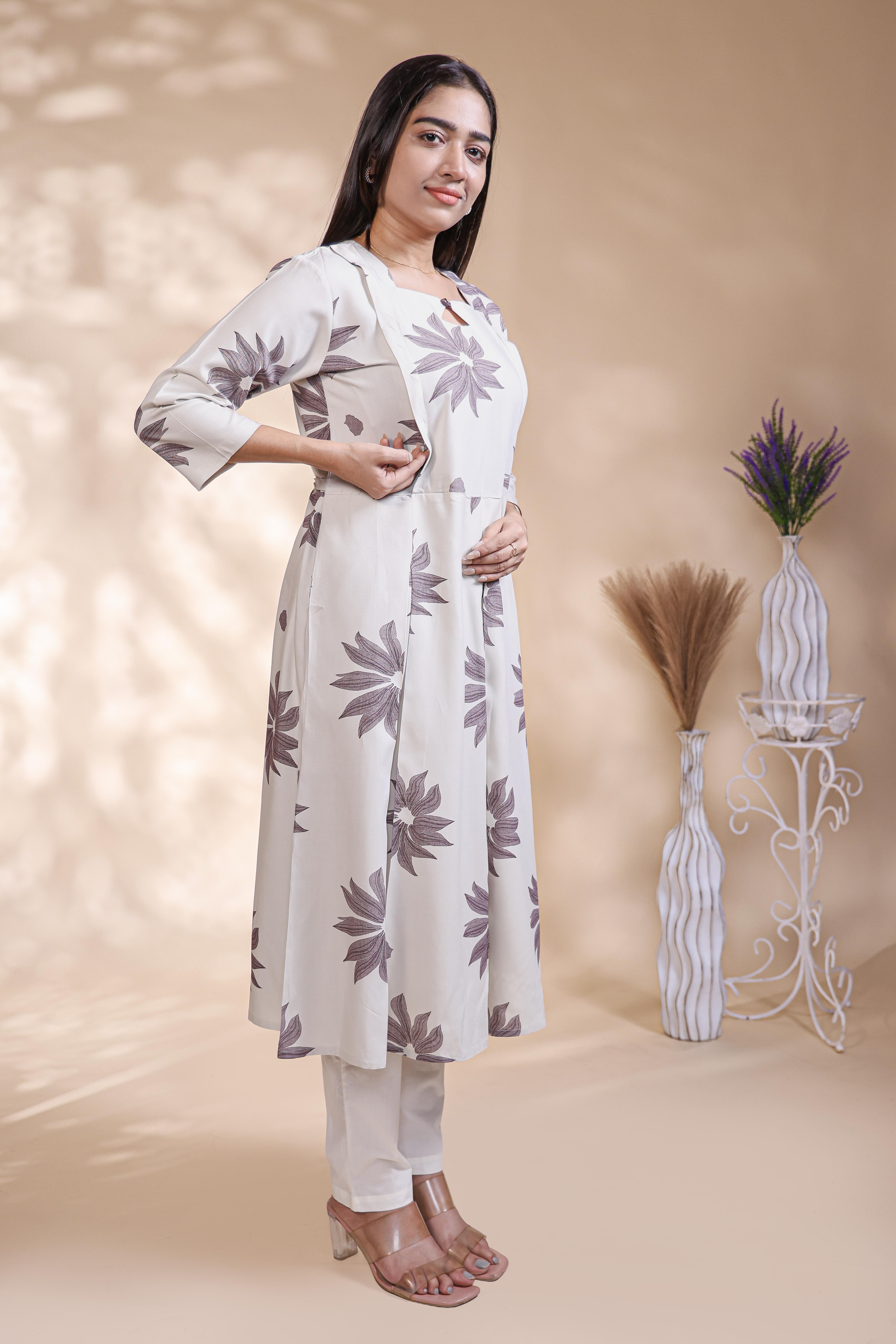 White floral printed A-line maternity wear with 3/4 sleeves and keyhole neck