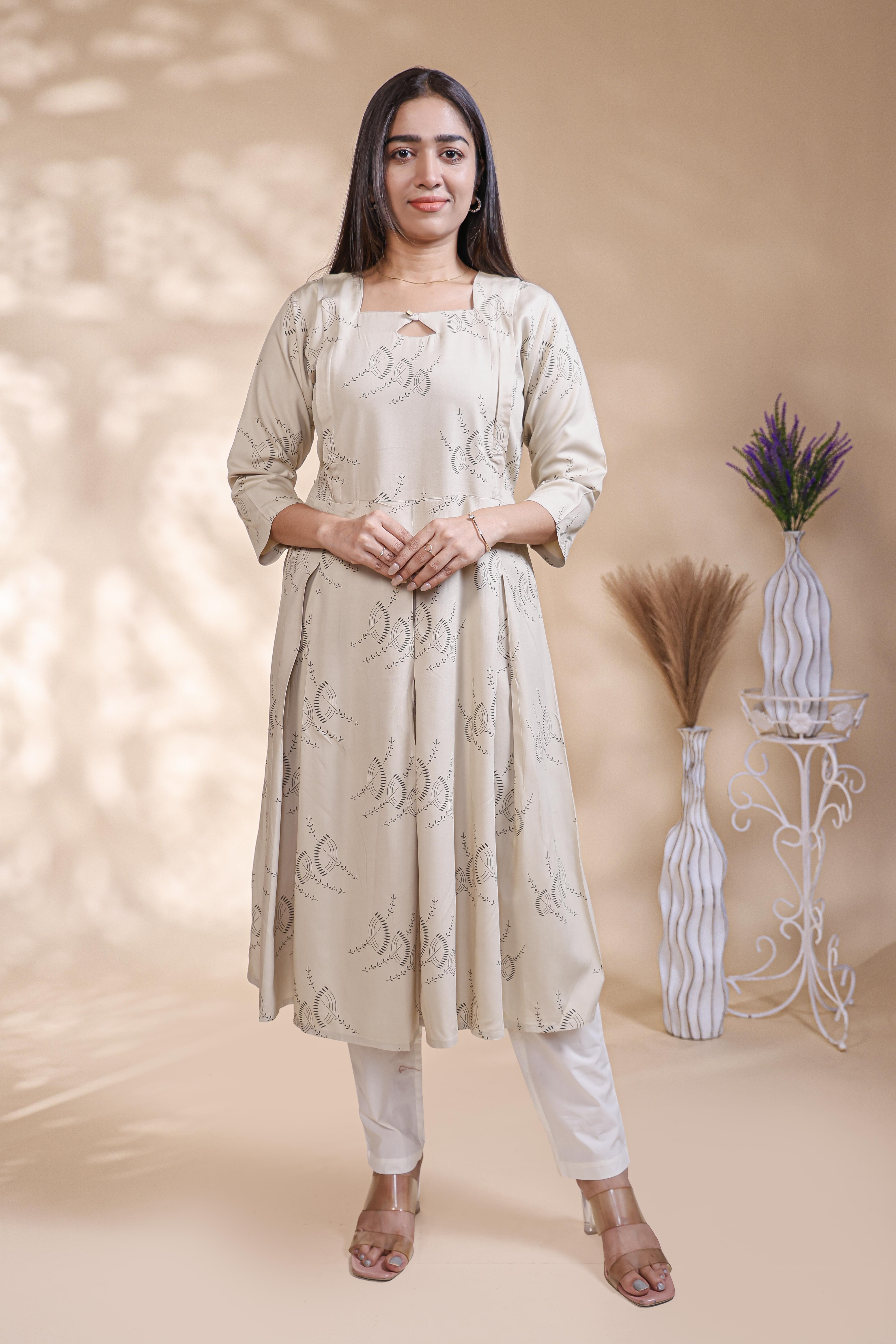 Off White floral printed A-line maternity wear with 3/4 sleeves and keyhole neck