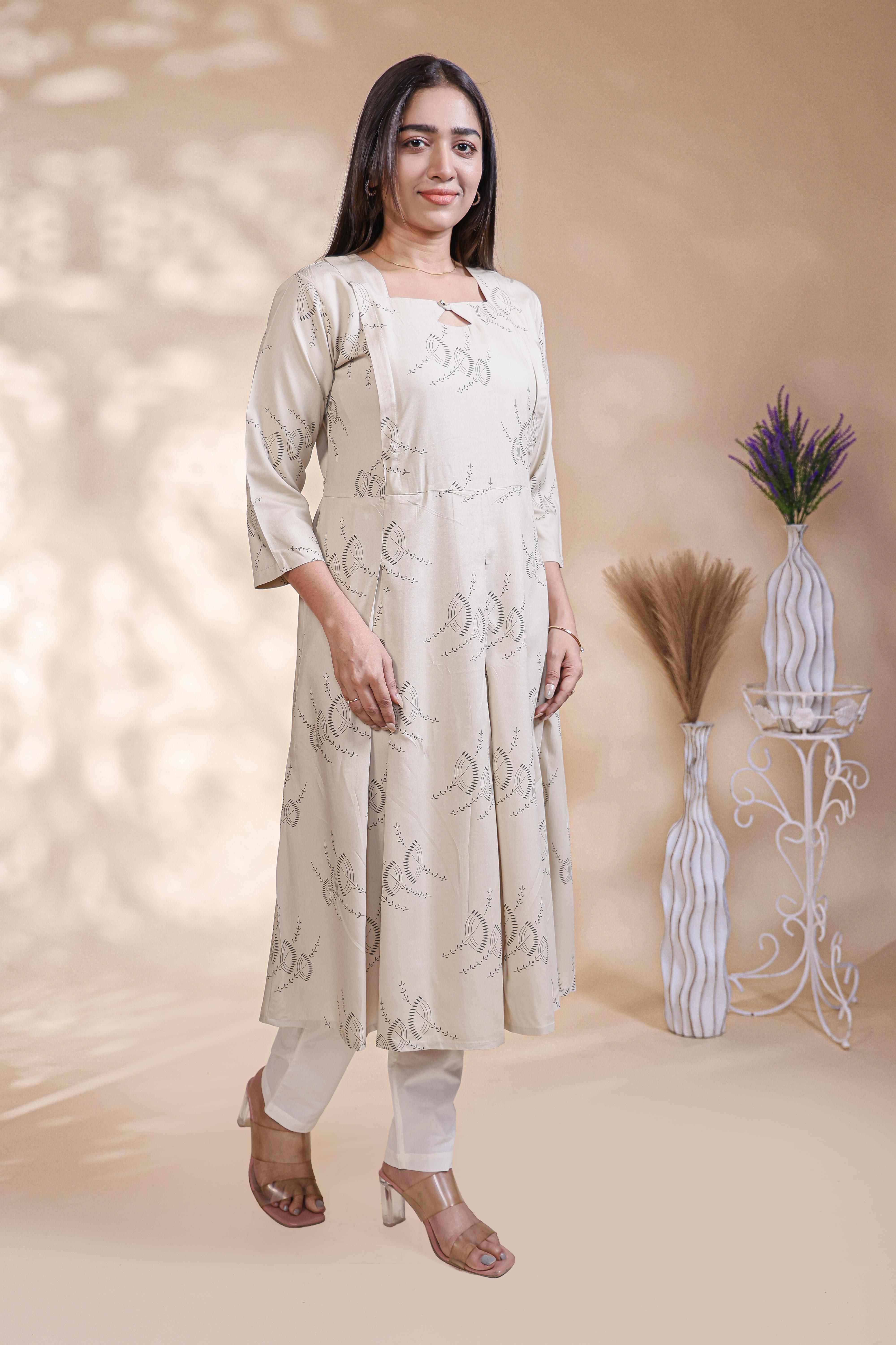 Off White floral printed A-line maternity wear with 3/4 sleeves and keyhole neck