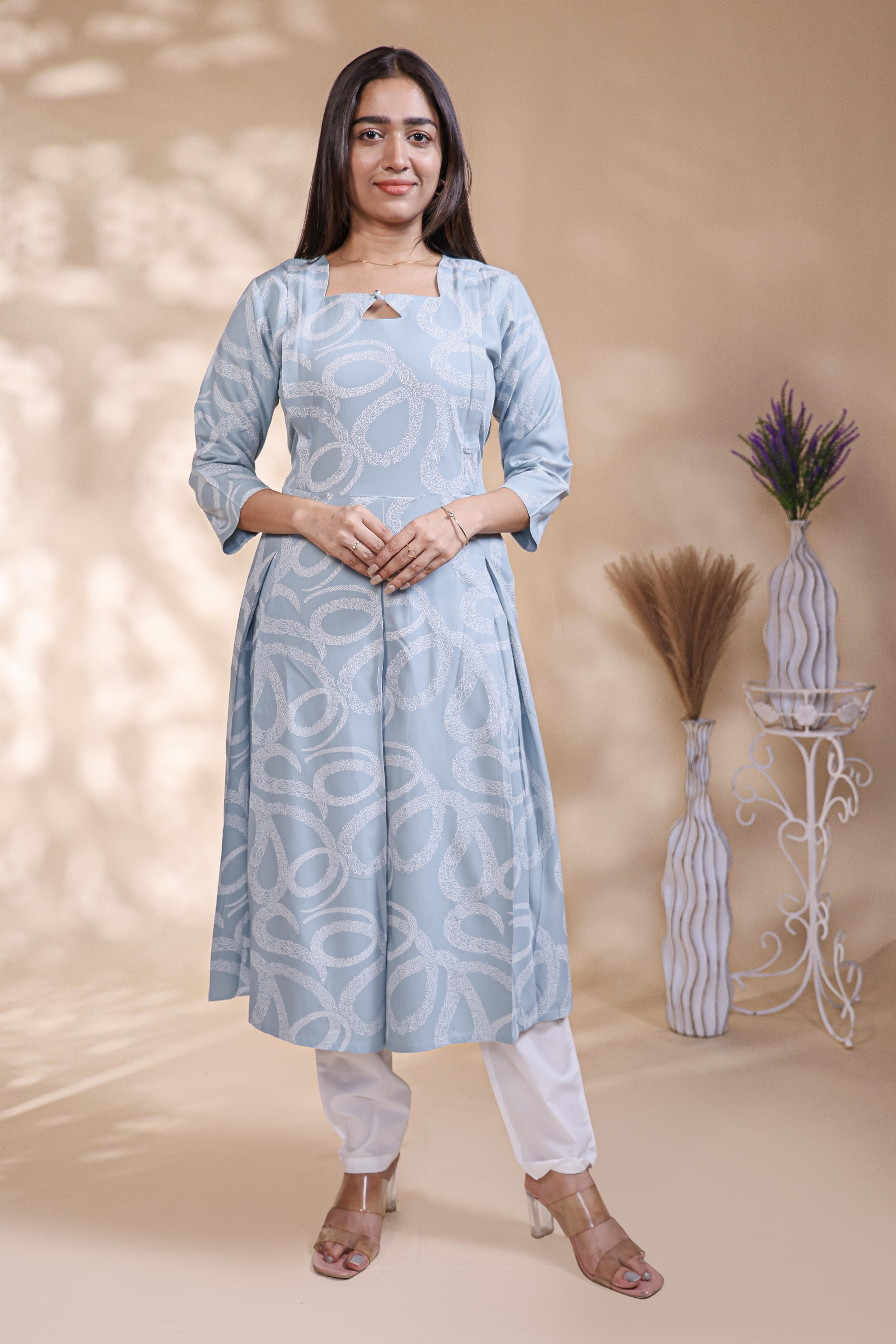 Baby blue abstract printed A-line maternity wear with 3/4 sleeves and keyhole neck