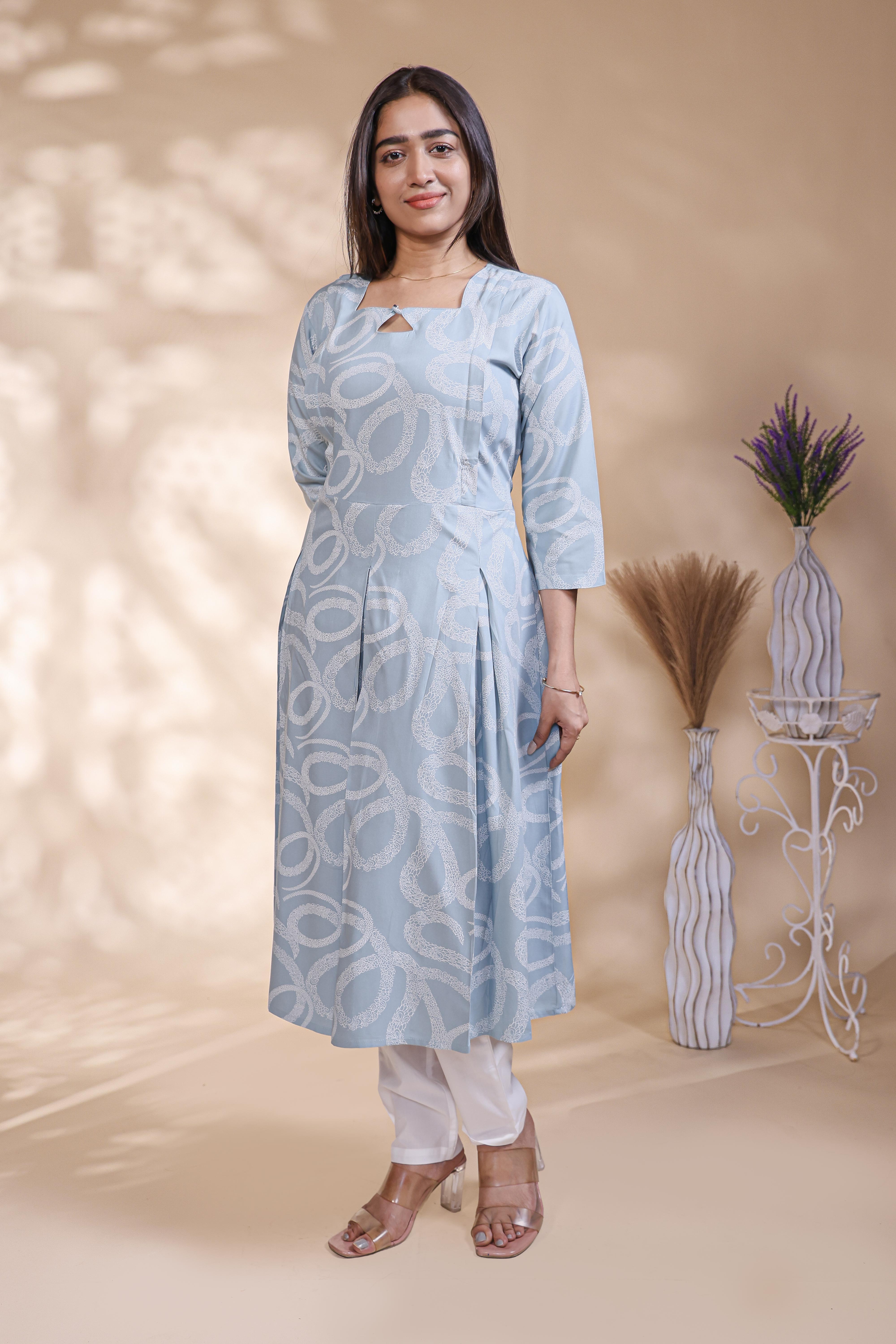 Baby blue abstract printed A-line maternity wear with 3/4 sleeves and keyhole neck