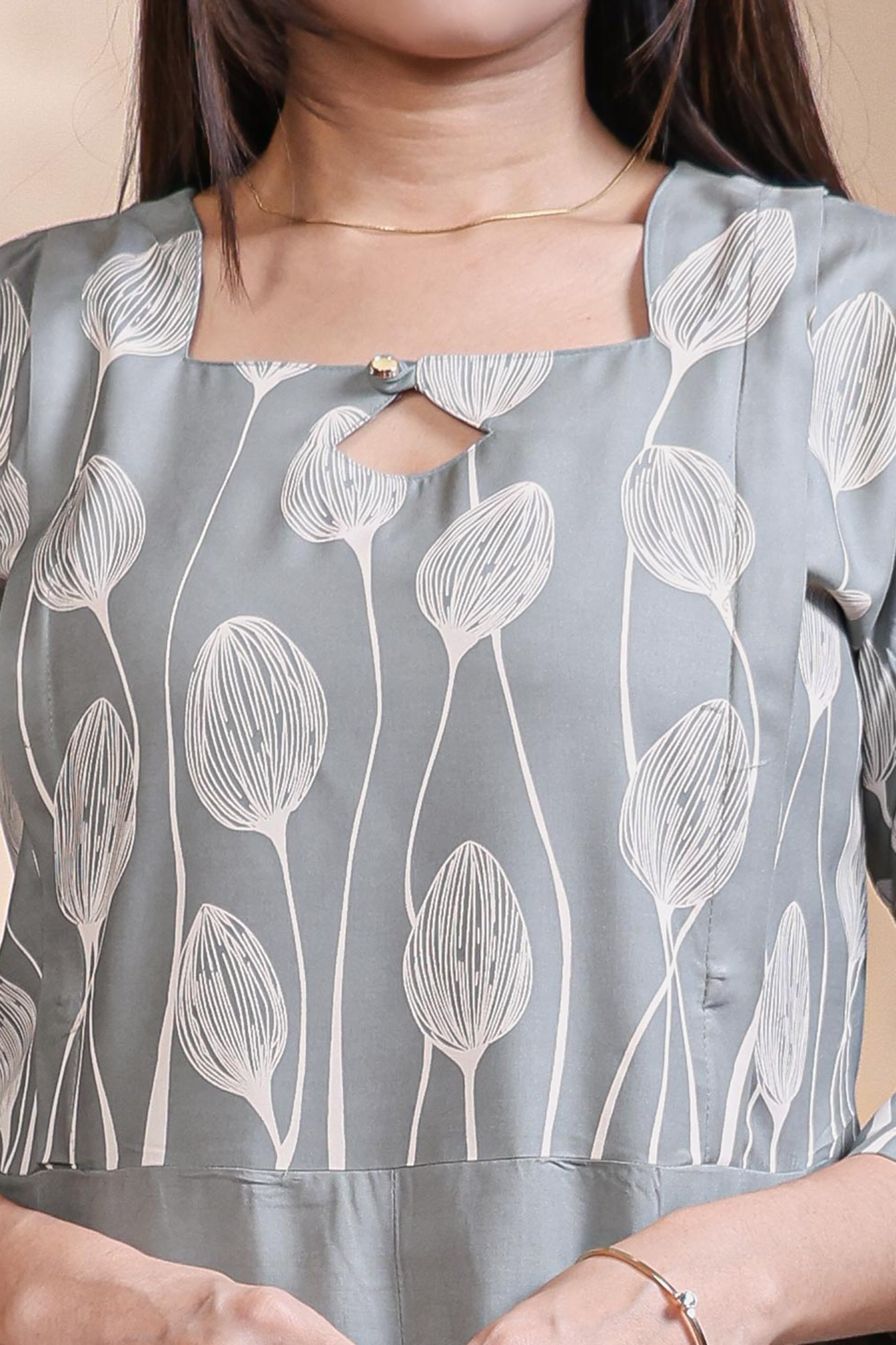 Grey floral printed A-line maternity wear with 3/4 sleeves and keyhole neck