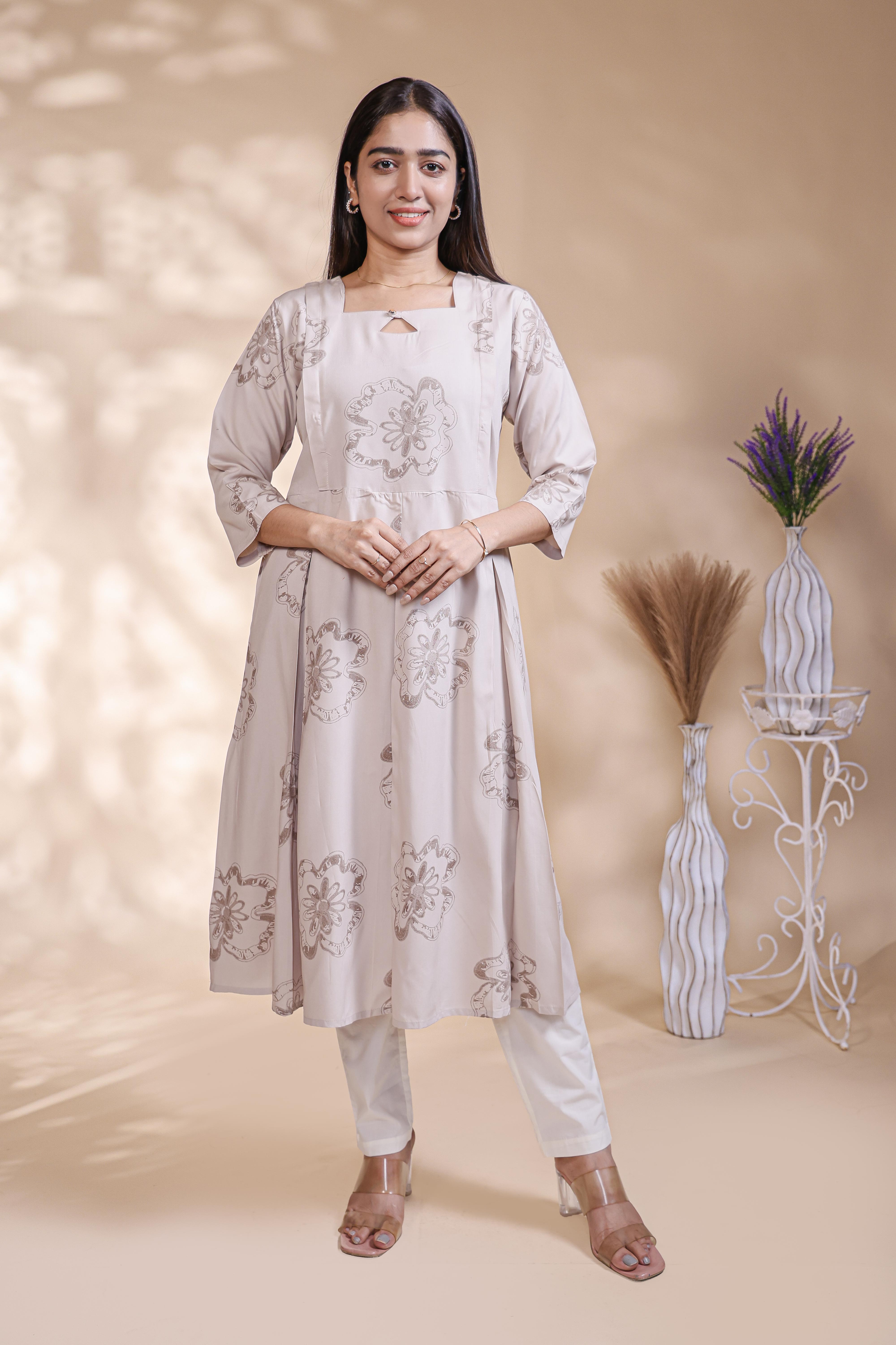 Beige floral printed A-line maternity wear with 3/4 sleeves and keyhole neck