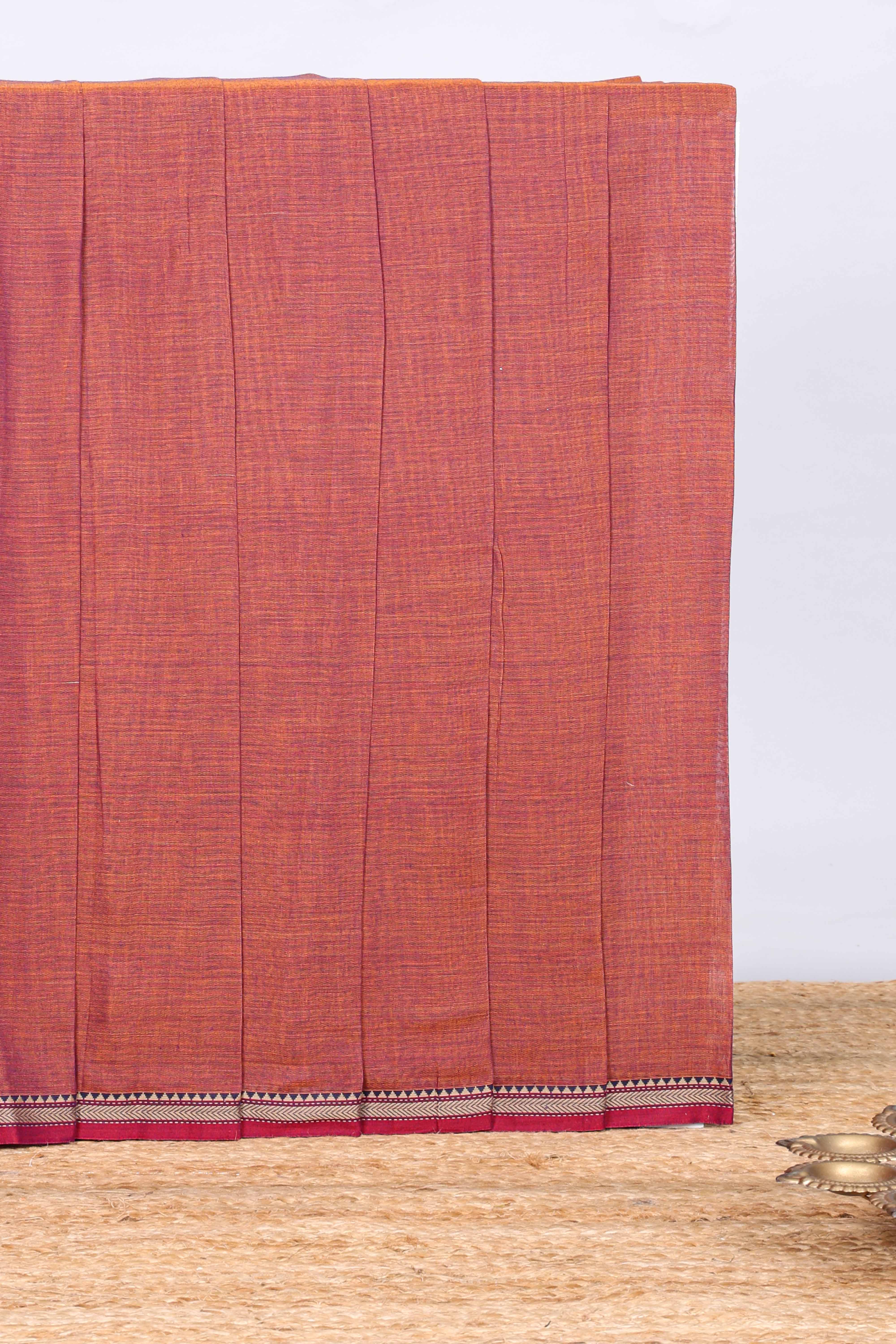Rust red plain narayanapet cotton saree with contrast temple border and stripe pallu