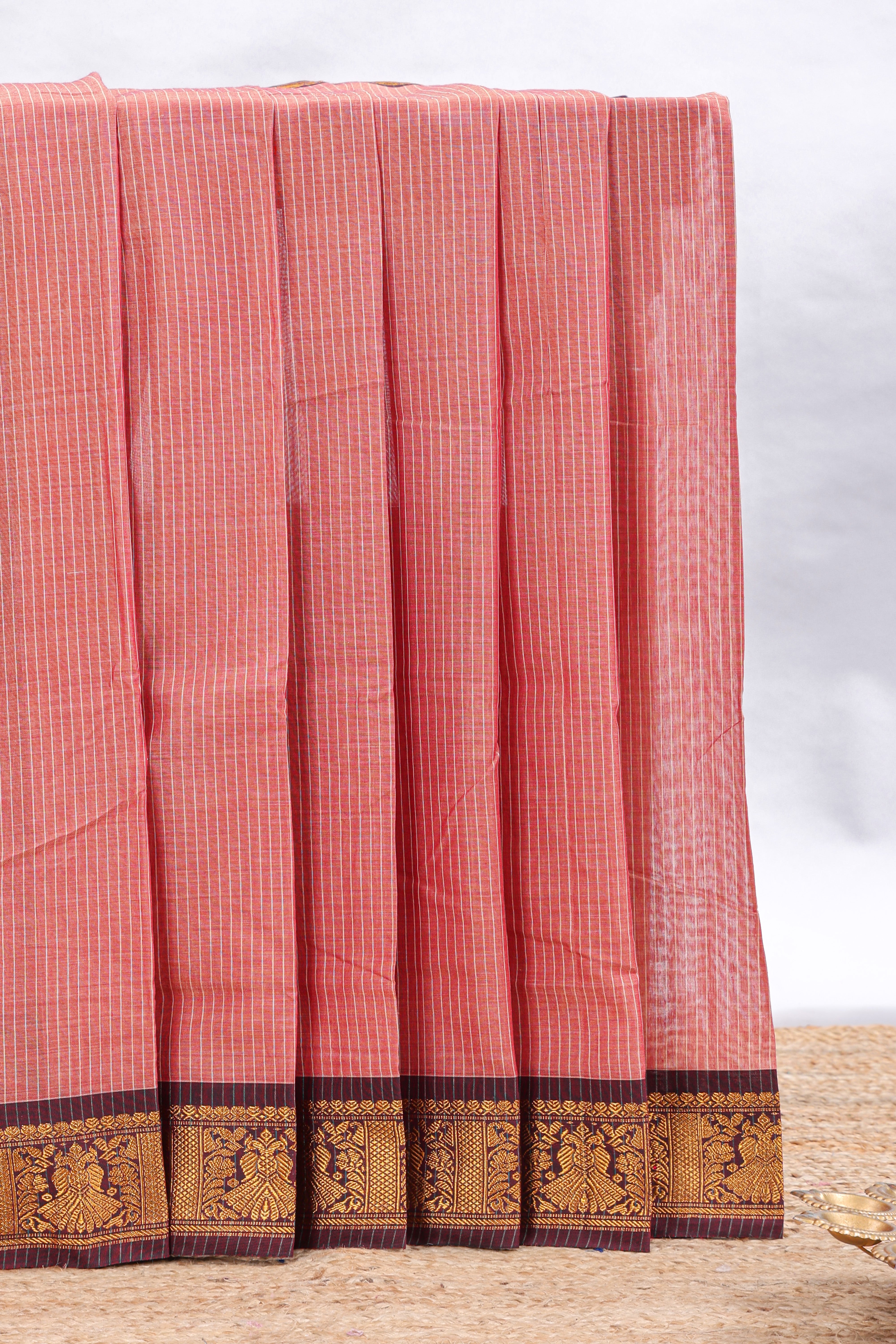 Peach striped narayanapet cotton saree with contrast zari border and matching striped blouse