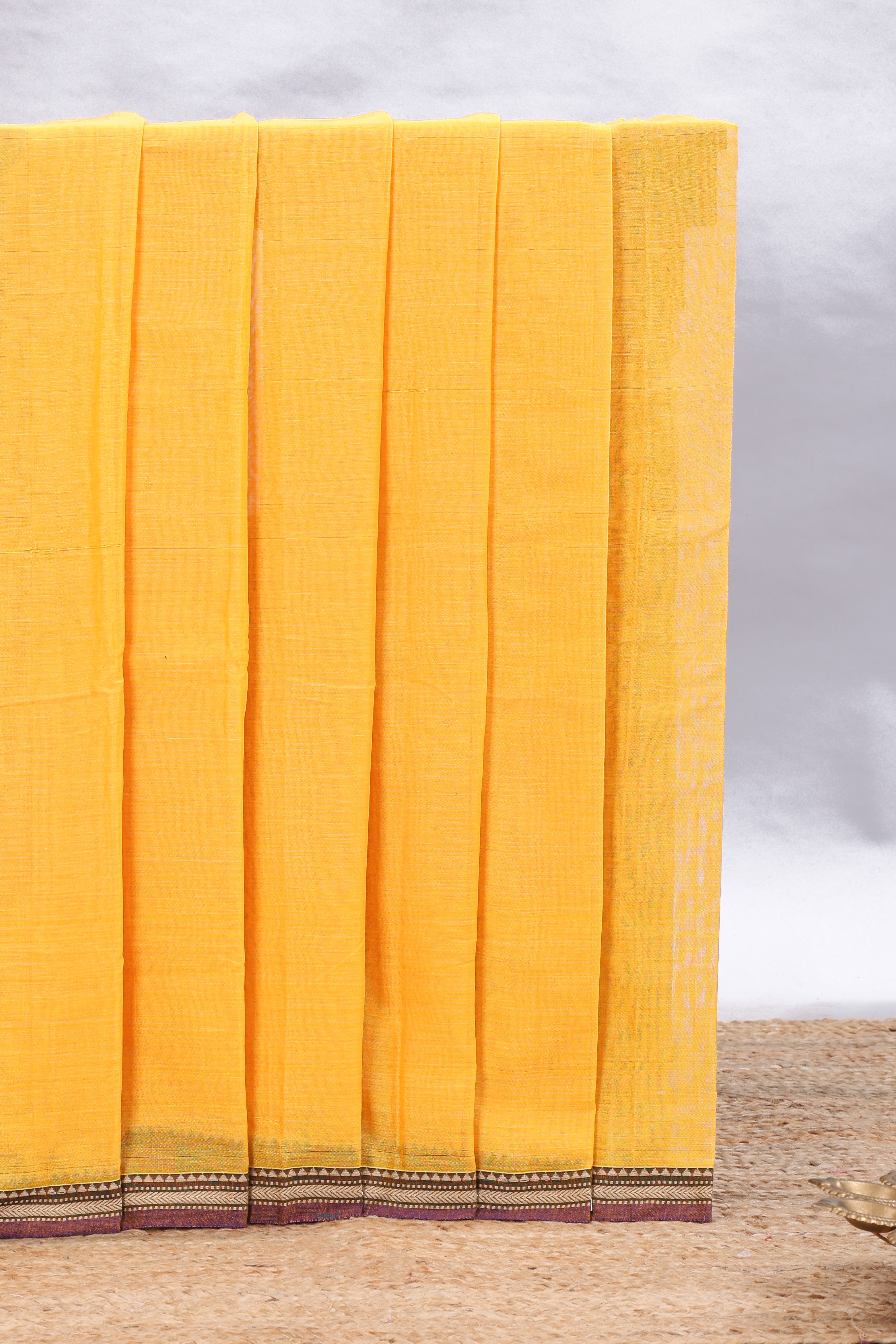 Yellow plain narayanapet cotton saree with contrast border and matching blouse