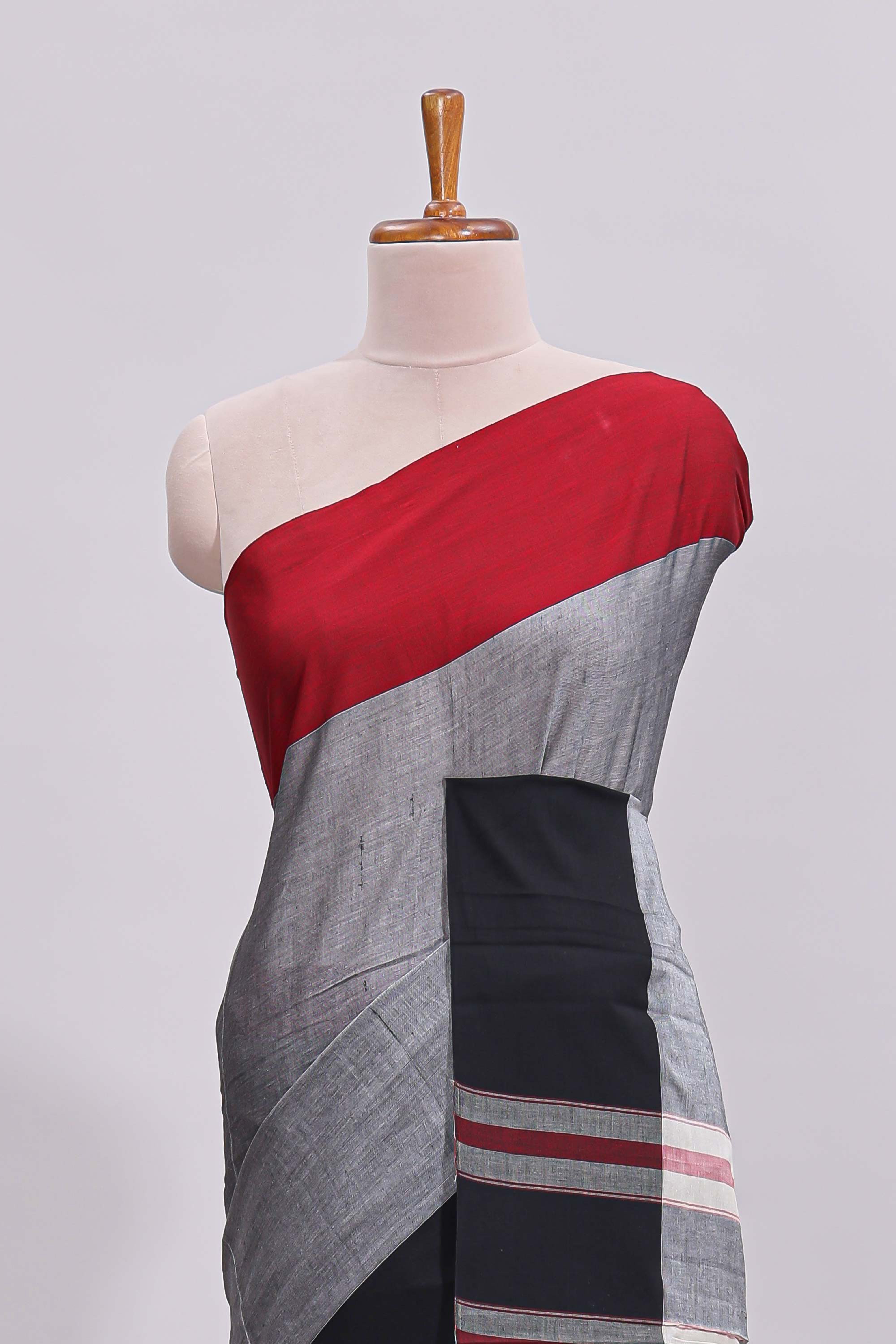 Grey plain narayanapet cotton saree with contrast border and striped blouse