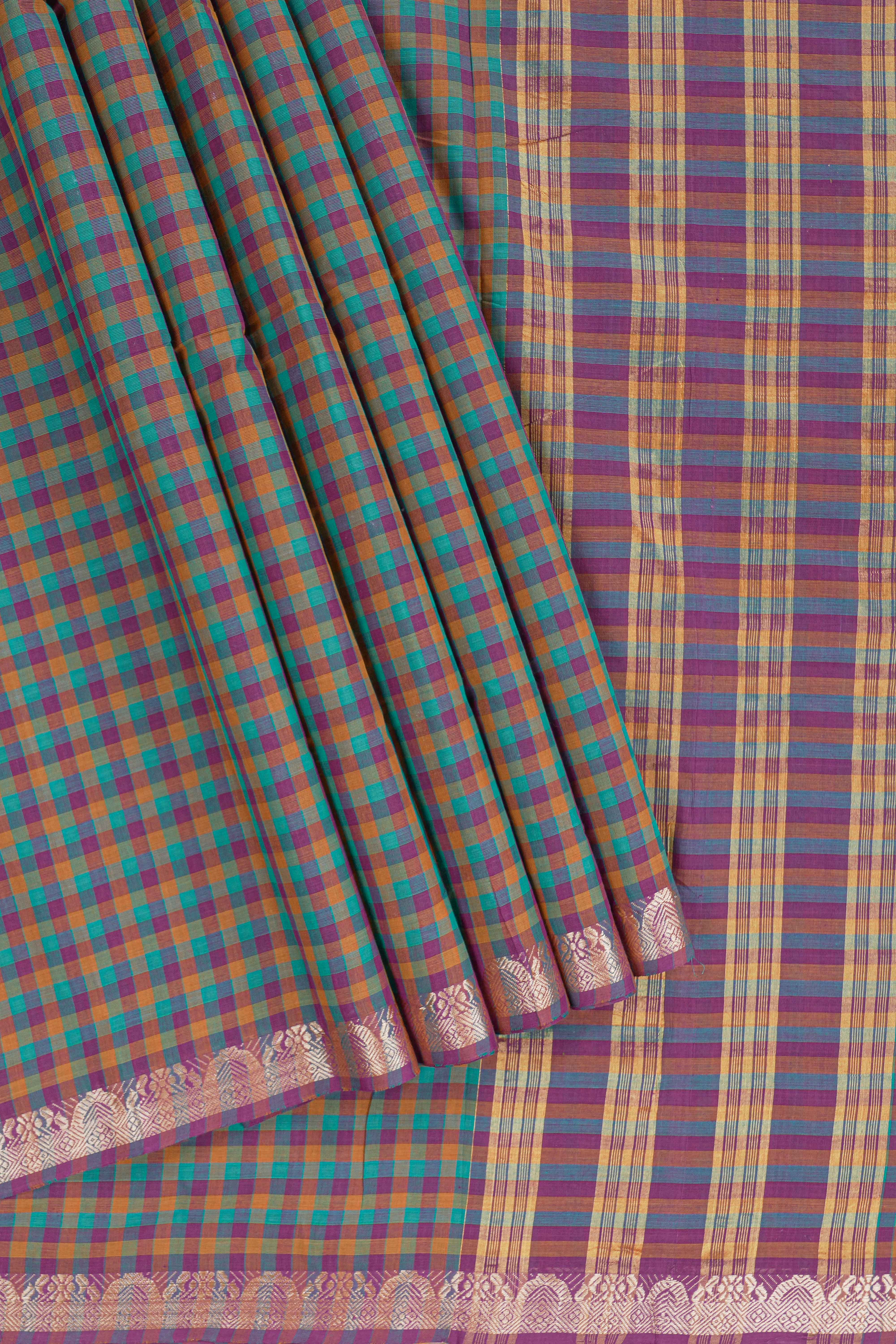 Traditional grey Madisar Style Nine Yard Saree with checks and traditional thread motifs border and contrast pallu along with blouse piece