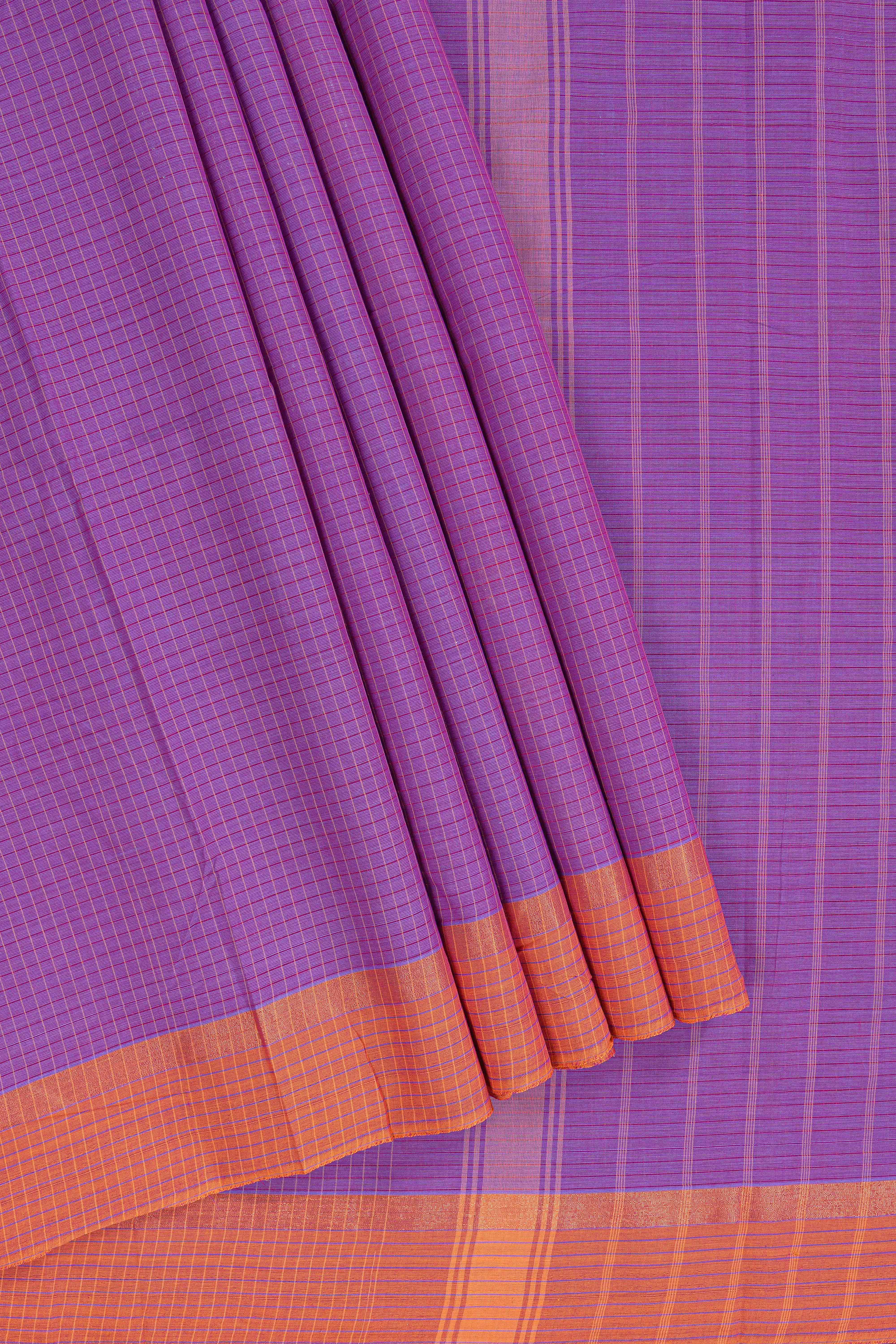 Traditional purple colour Madisar Style Nine Yard Saree with Plain body and traditional thread motifs border and self pallu along with blouse piece