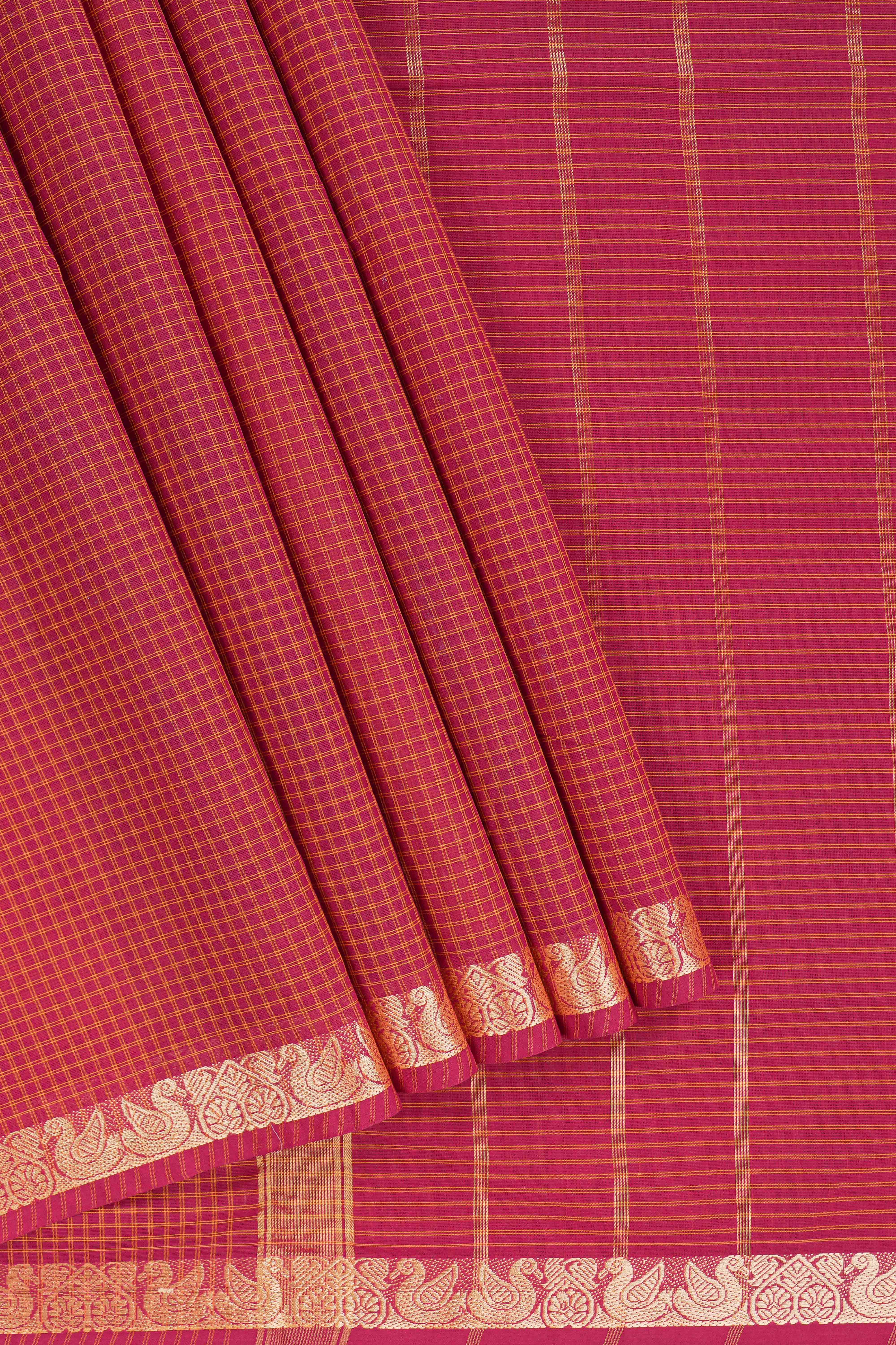 Traditional red colour Madisar Style Nine Yard Saree with checks and traditional thread motifs border and self pallu along with blouse piece