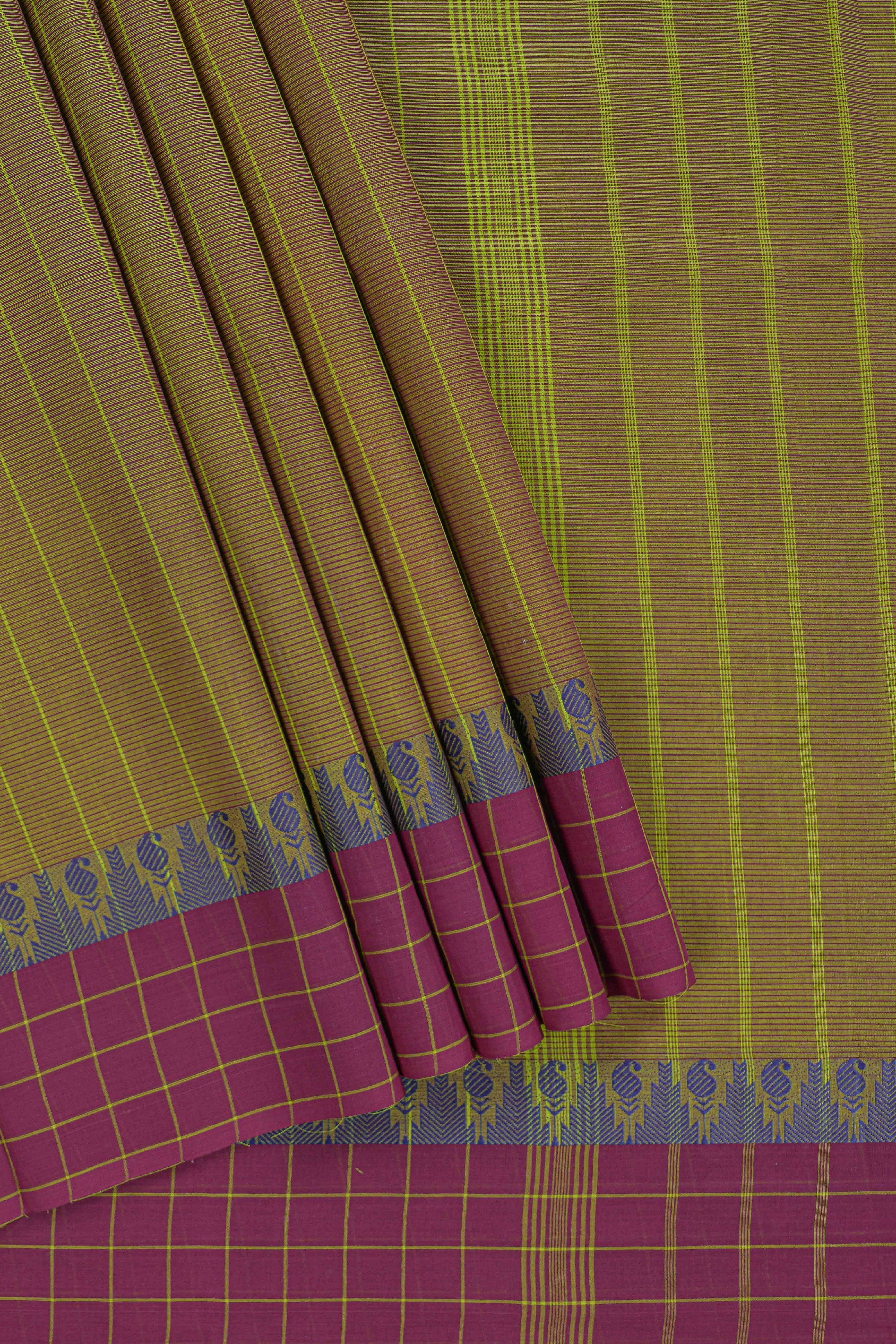 Traditional olive green colour Madisar Style Nine Yard Saree with checks and contrast border and self pallu along with blouse piece