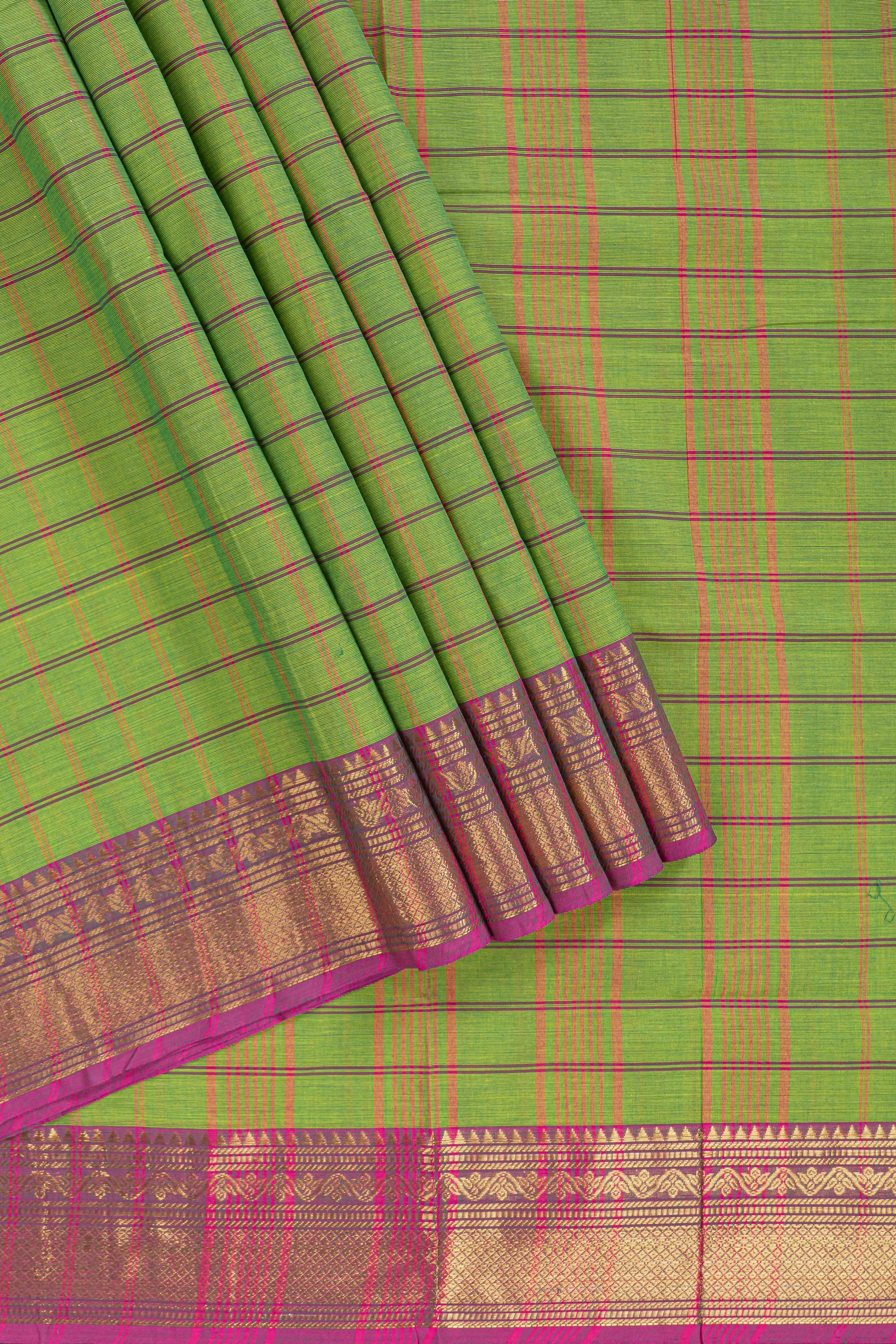 Traditional blue colour Madisar Style Nine Yard Saree with checks and contrast border and self pallu along with blouse piece