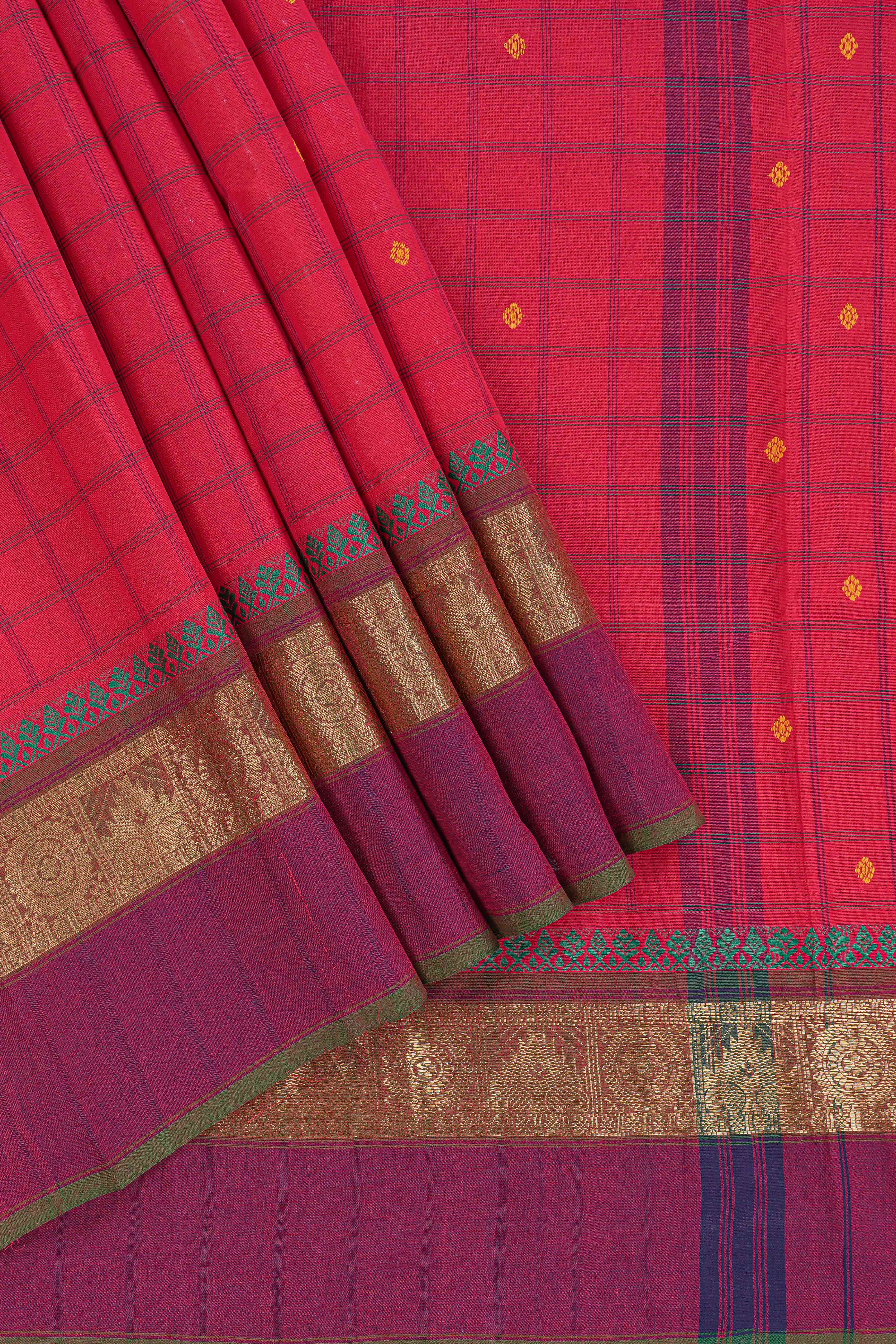 Traditional bright red colour Madisar Style Nine Yard Saree with checks and contrast border and self pallu along with blouse piece