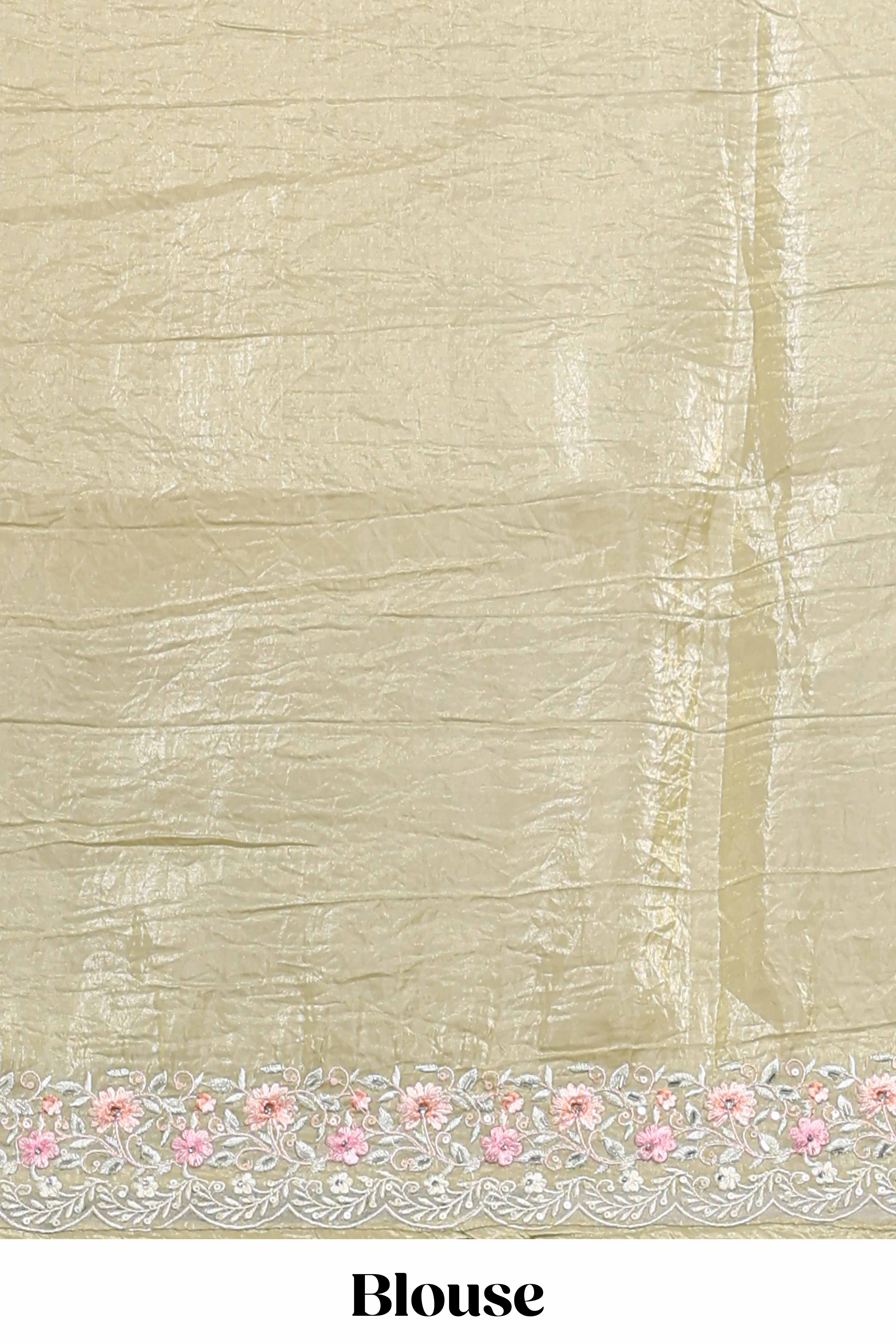 Pastel yellow organza saree featuring delicate floral embroidery intricate lace detailing on the border and pallu with a scalloped finishing along with matching blouse