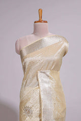 Cream organza saree featuring delicate floral embroidery intricate with silverborder along with blouse
