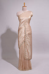Ivory beige organza saree with plain body border and pallu with a scalloped finishing along with matching blouse