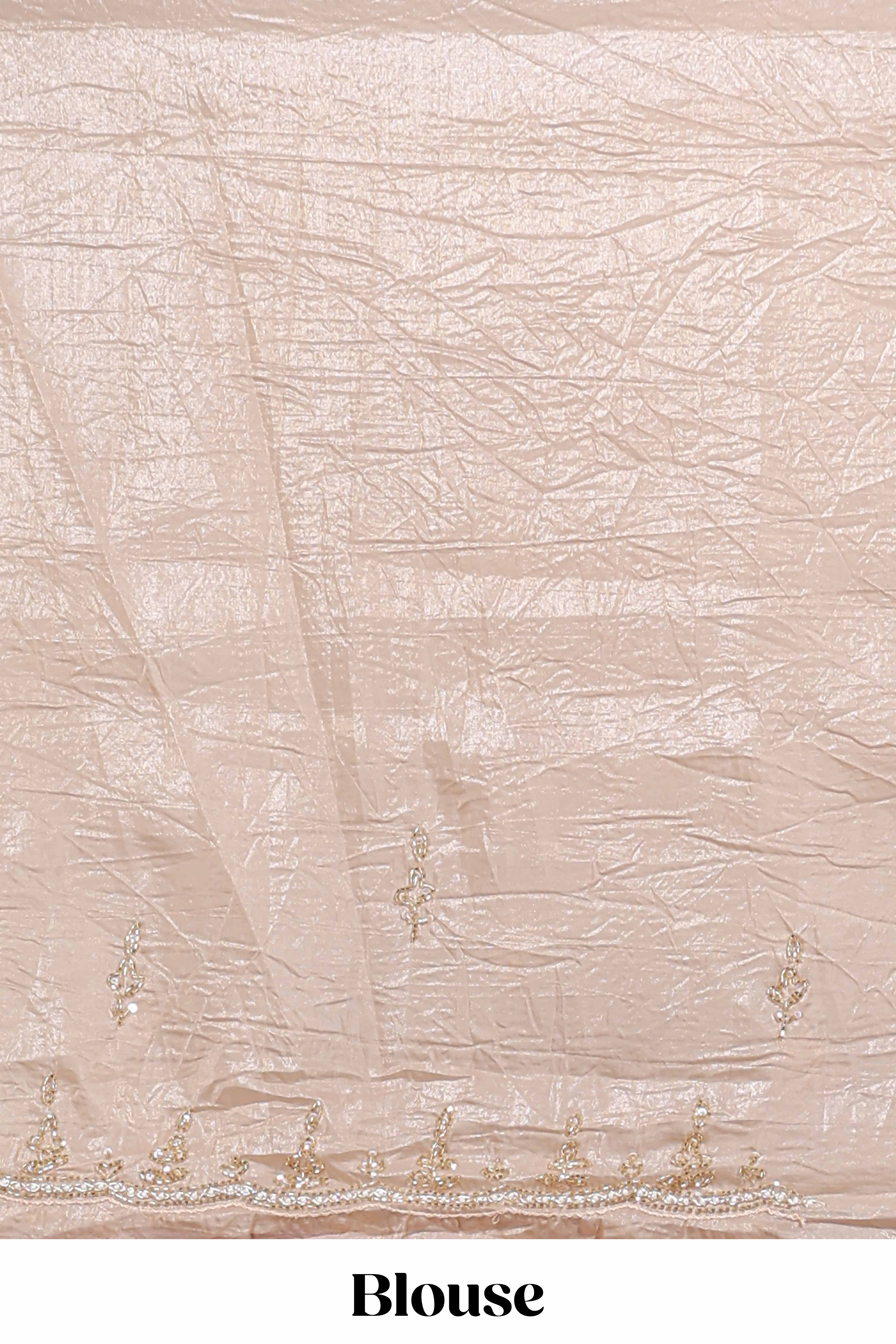 Ivory beige organza saree with plain body border and pallu with a scalloped finishing along with matching blouse