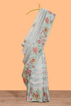 Green striped design organza saree with floral design border and matching floral motifs blouse