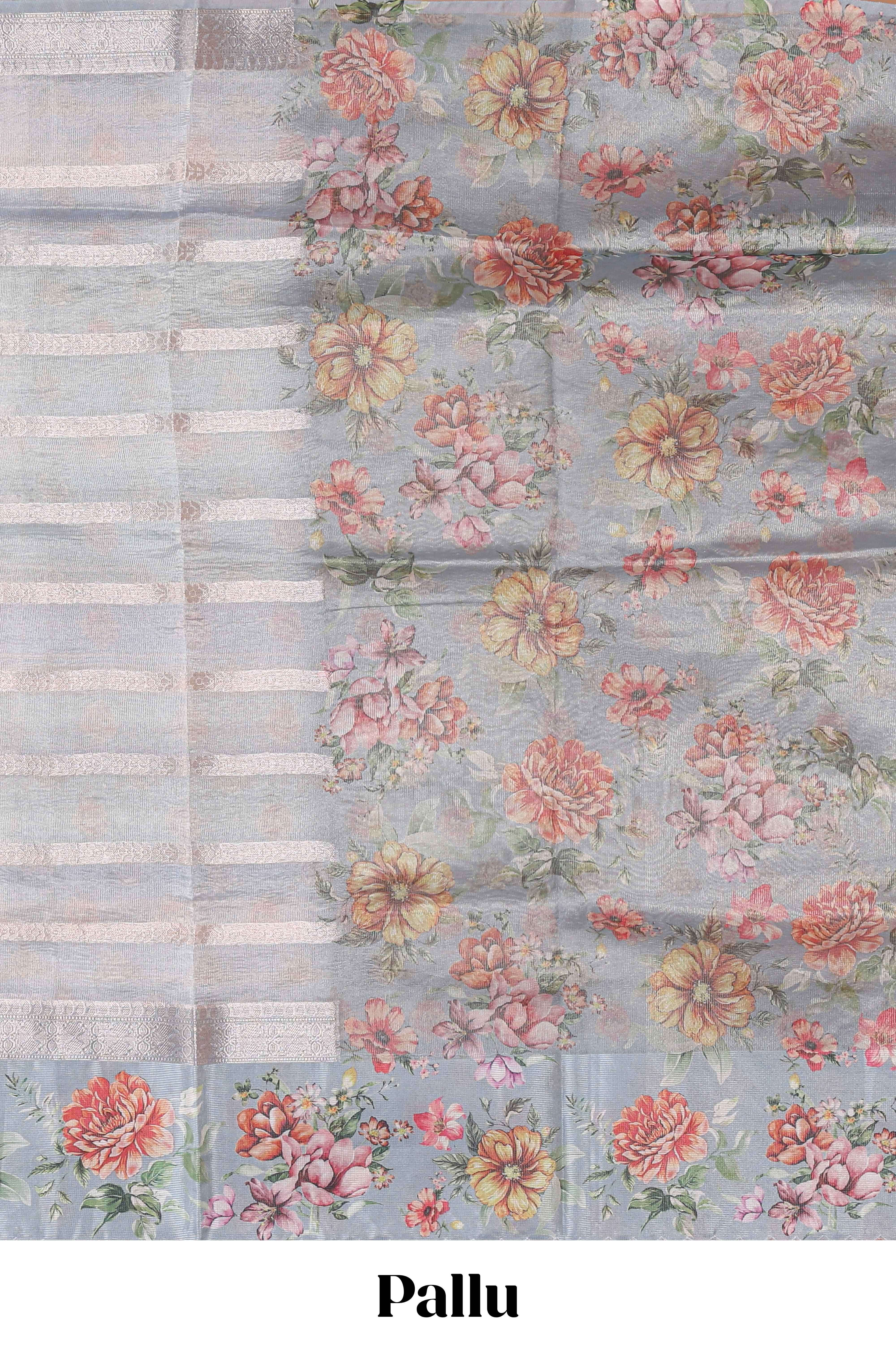 Grey shade striped design organza saree with floral design border and matching floral motifs blouse