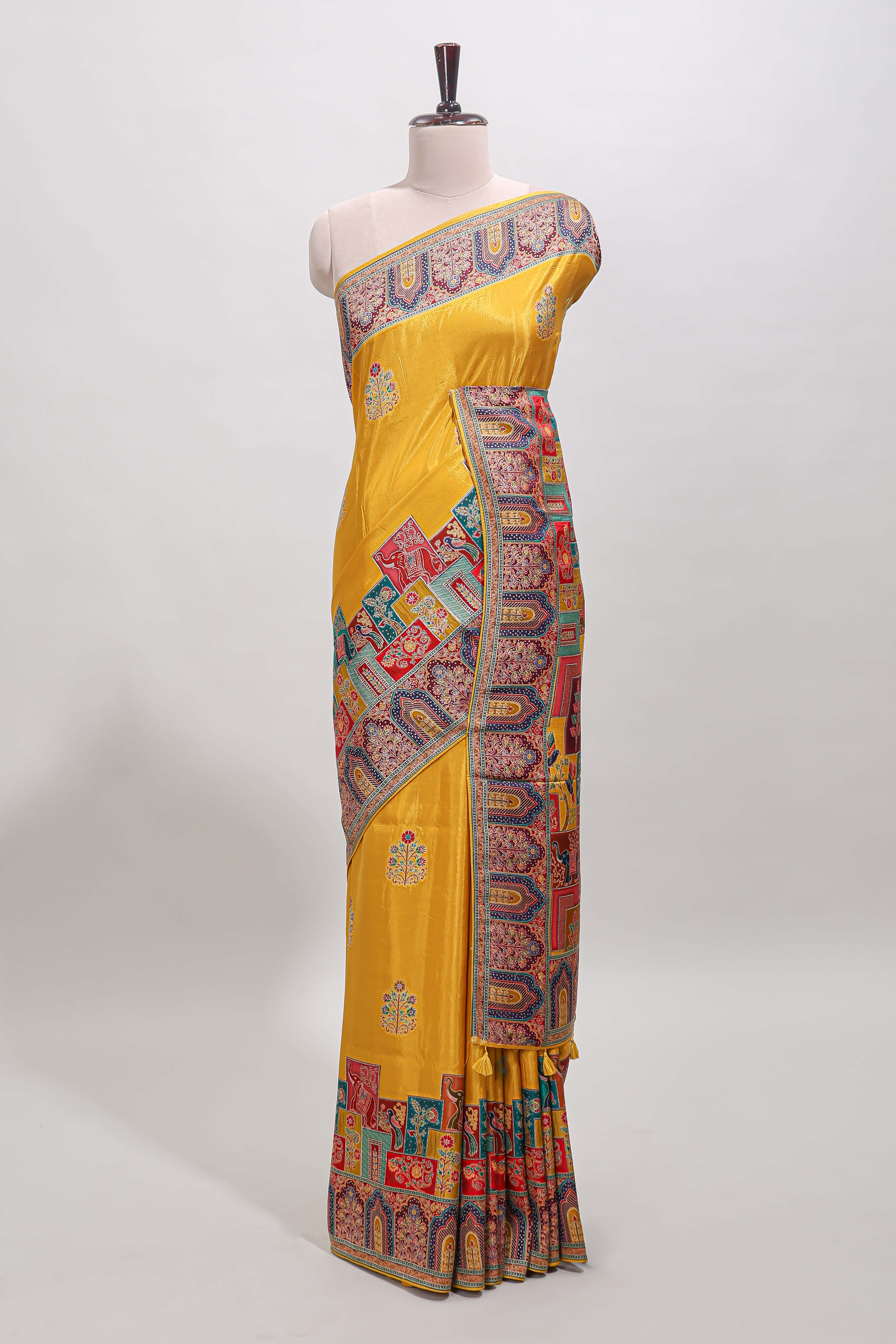 Yellow floral design motifs banarasi silk saree with contrast floral print border and matching blouse