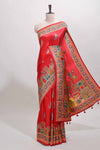 Red floral design motifs banarasi silk saree with contrast floral print border and matching blouse