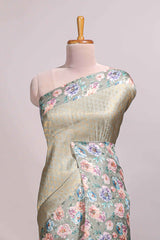 Green floral zari motifs banarasi silk saree with contrast border and printed blouse