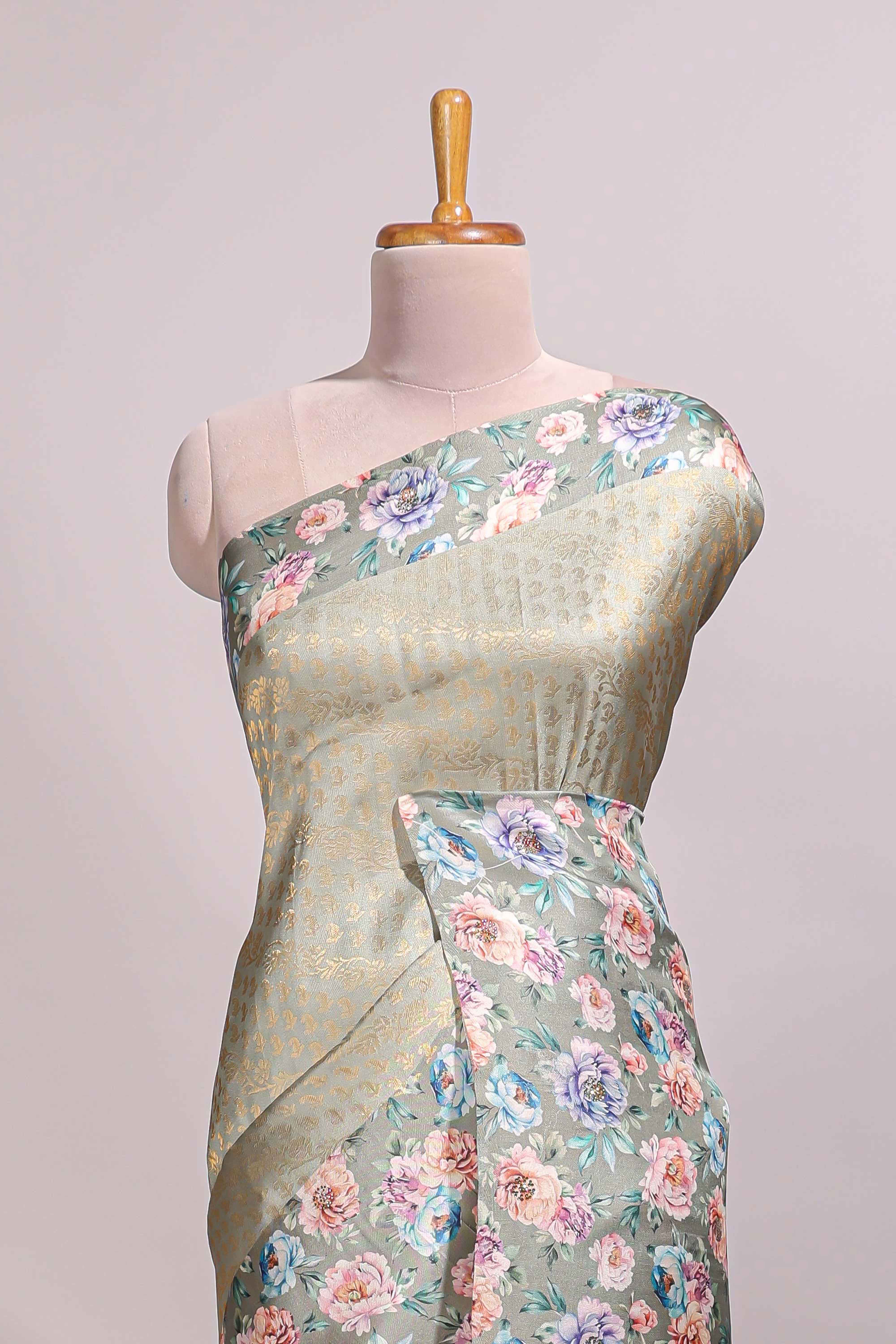Green floral zari motifs banarasi silk saree with contrast border and printed blouse