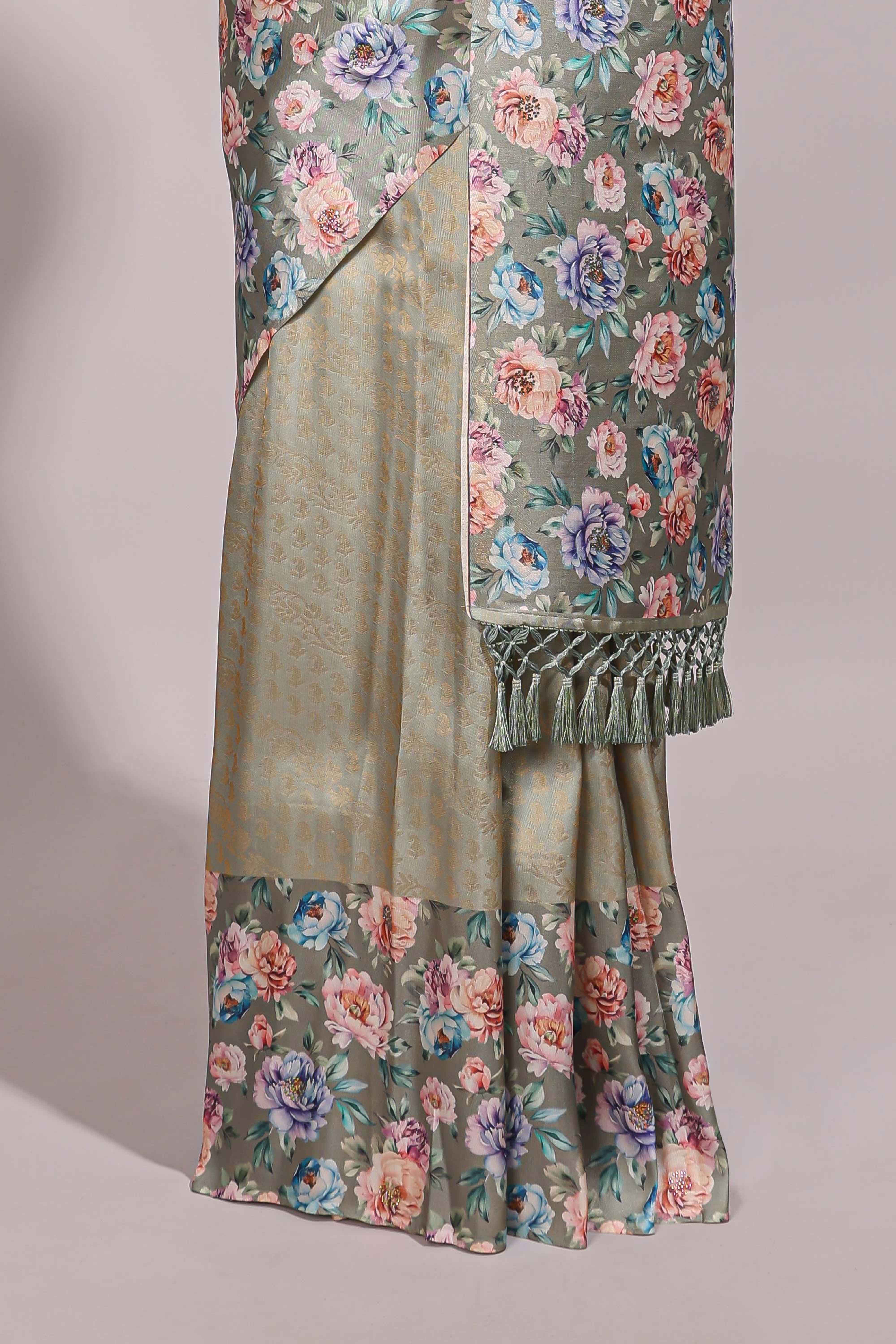 Green floral zari motifs banarasi silk saree with contrast border and printed blouse