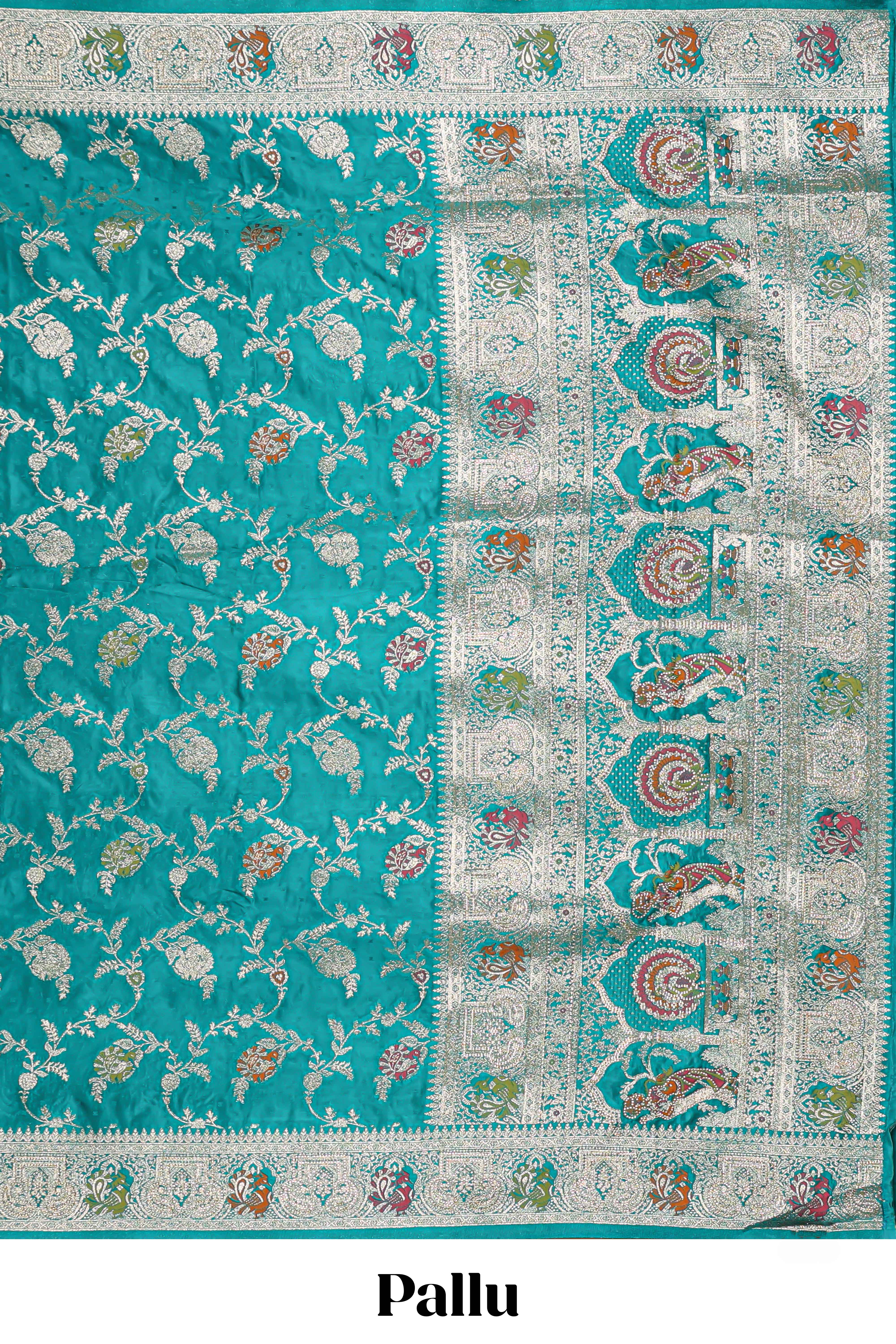 Green floral zari design banarasi silk saree with self border and matching printed blouse