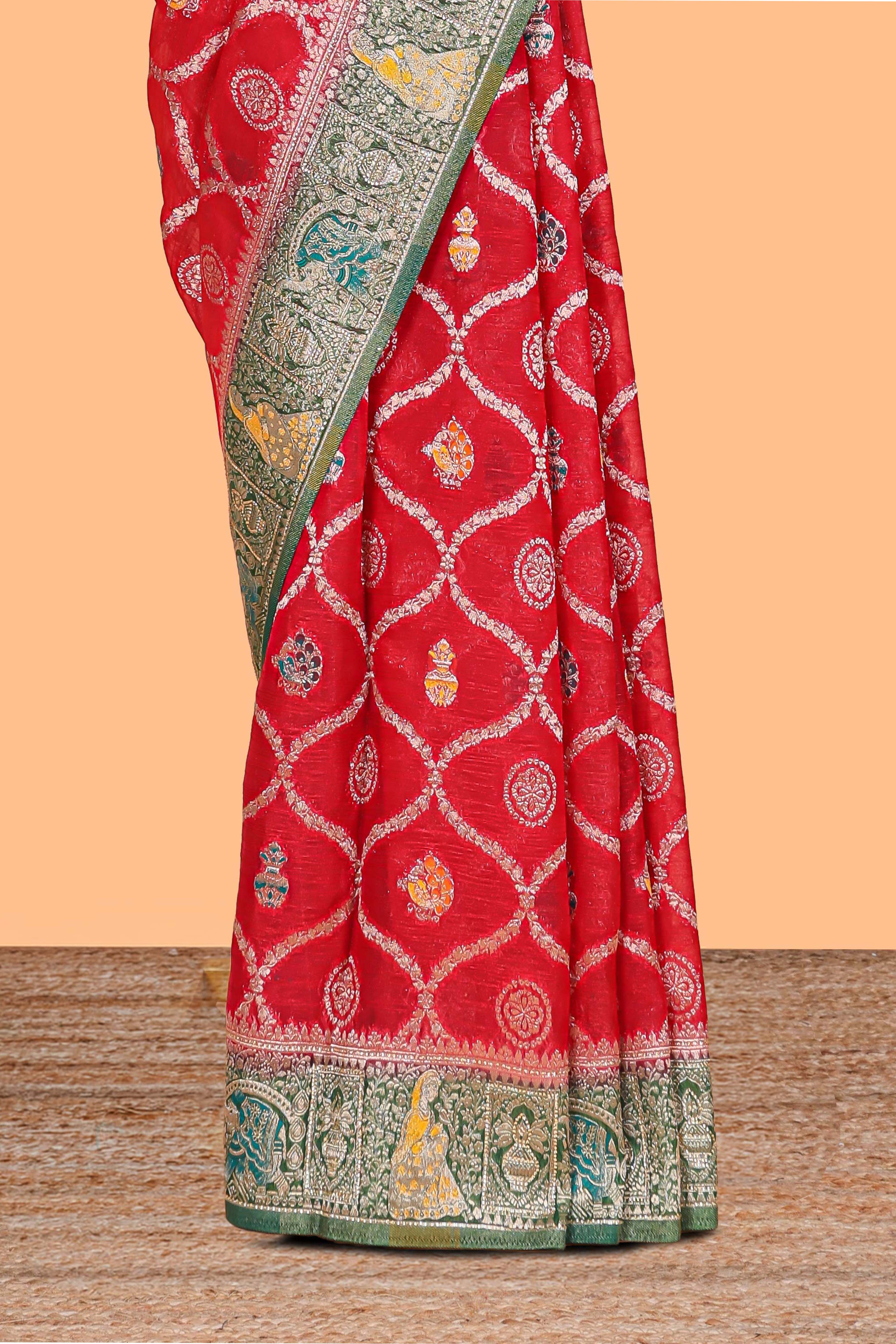 Red floral design banarasi silk saree with contrast border and floral printed blouse