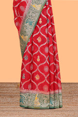 Red floral design banarasi silk saree with contrast border and floral printed blouse