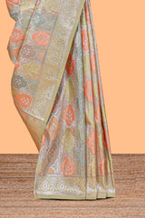 Pastel mint green floral design motifs banarasi silk saree with self border and matching floral printed blouse