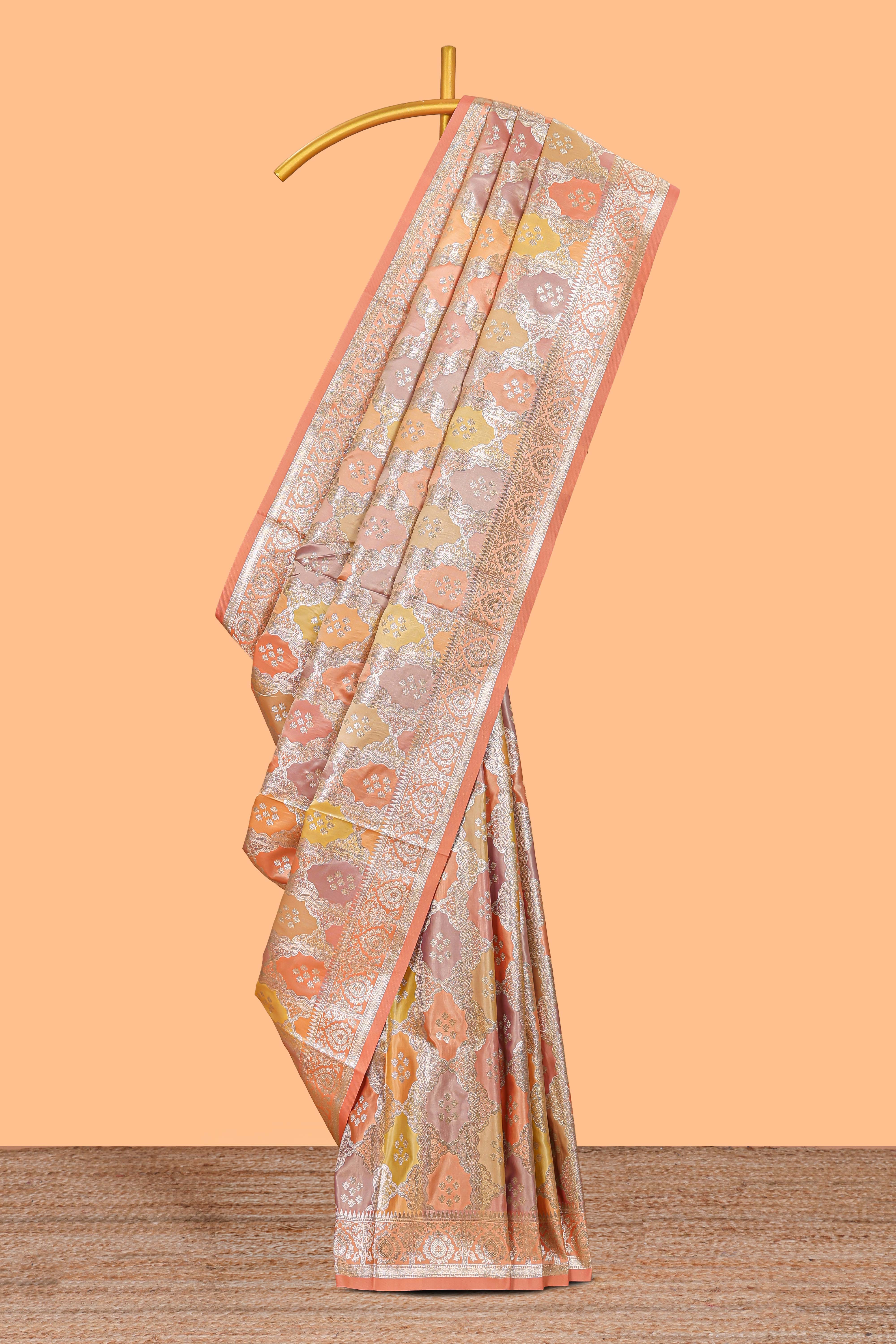 Pastel orange floral design motifs banarasi silk saree with self border and matching floral printed blouse