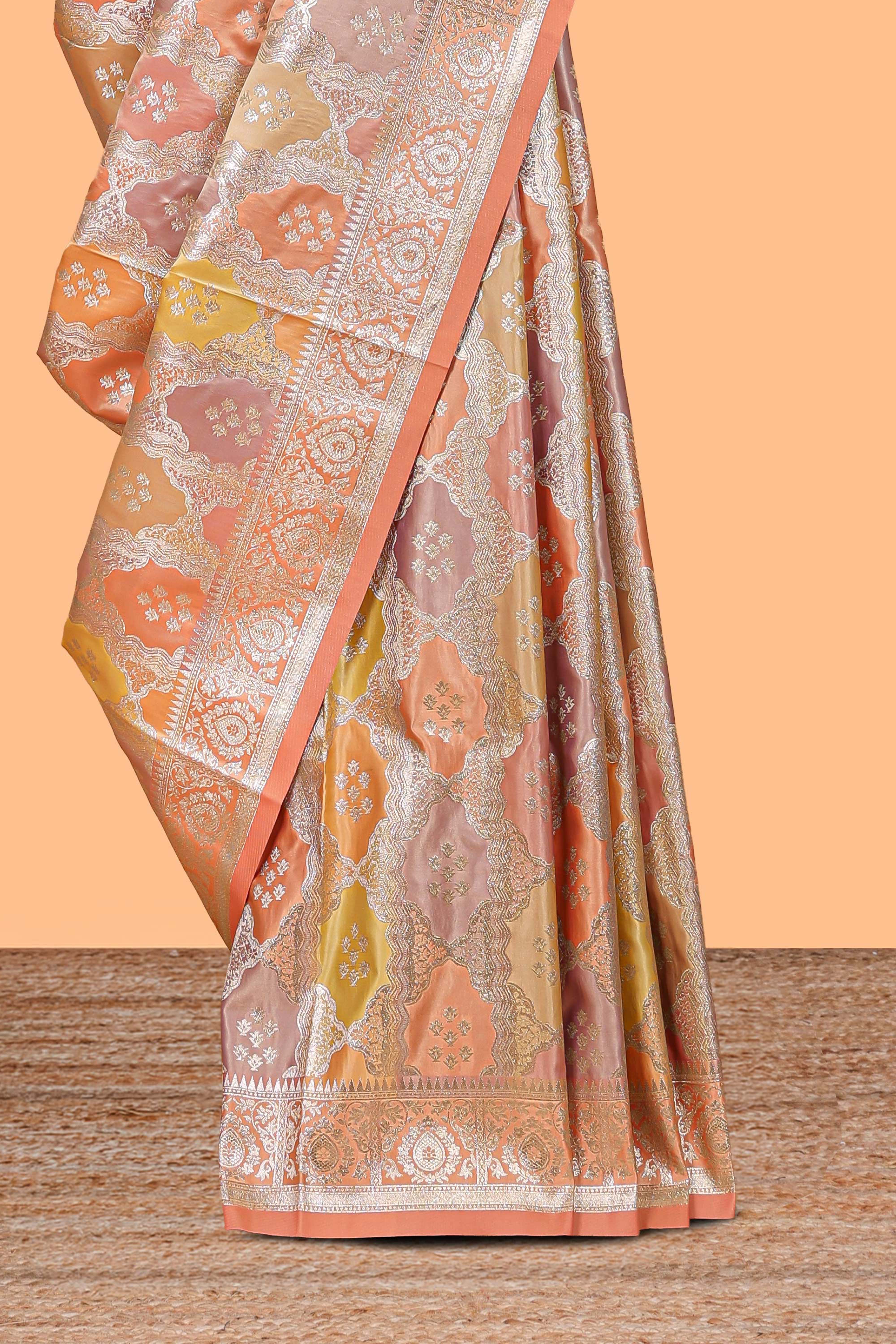 Pastel orange floral design motifs banarasi silk saree with self border and matching floral printed blouse