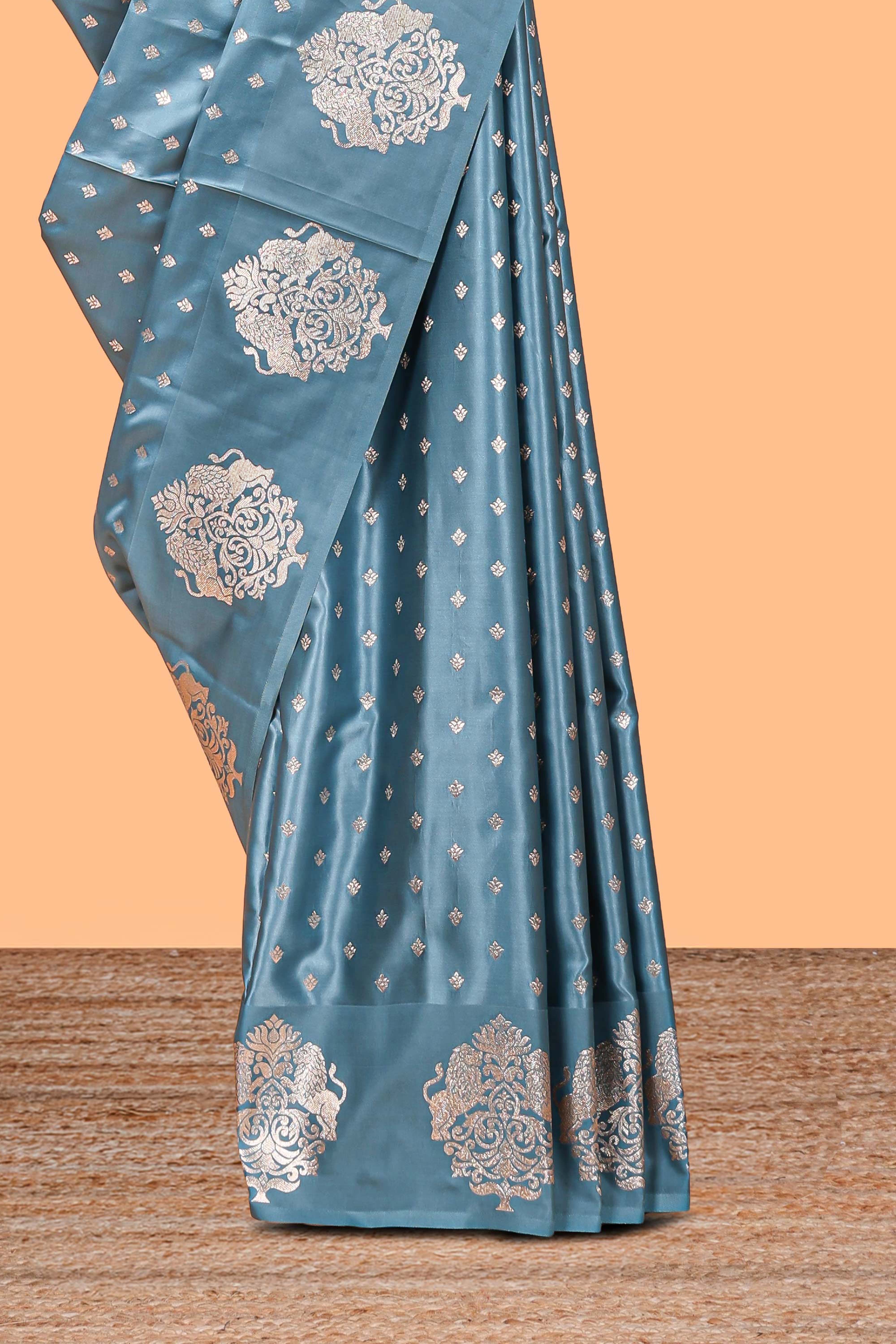 Blue floral motifs design banarasi silk saree with self zari border and matching floral printed blouse