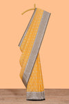 Yellow zari motifs design banarasi silk saree with contrast border and matching blouse
