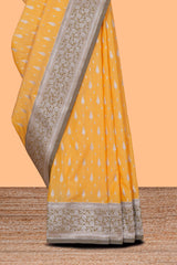 Yellow zari motifs design banarasi silk saree with contrast border and matching blouse