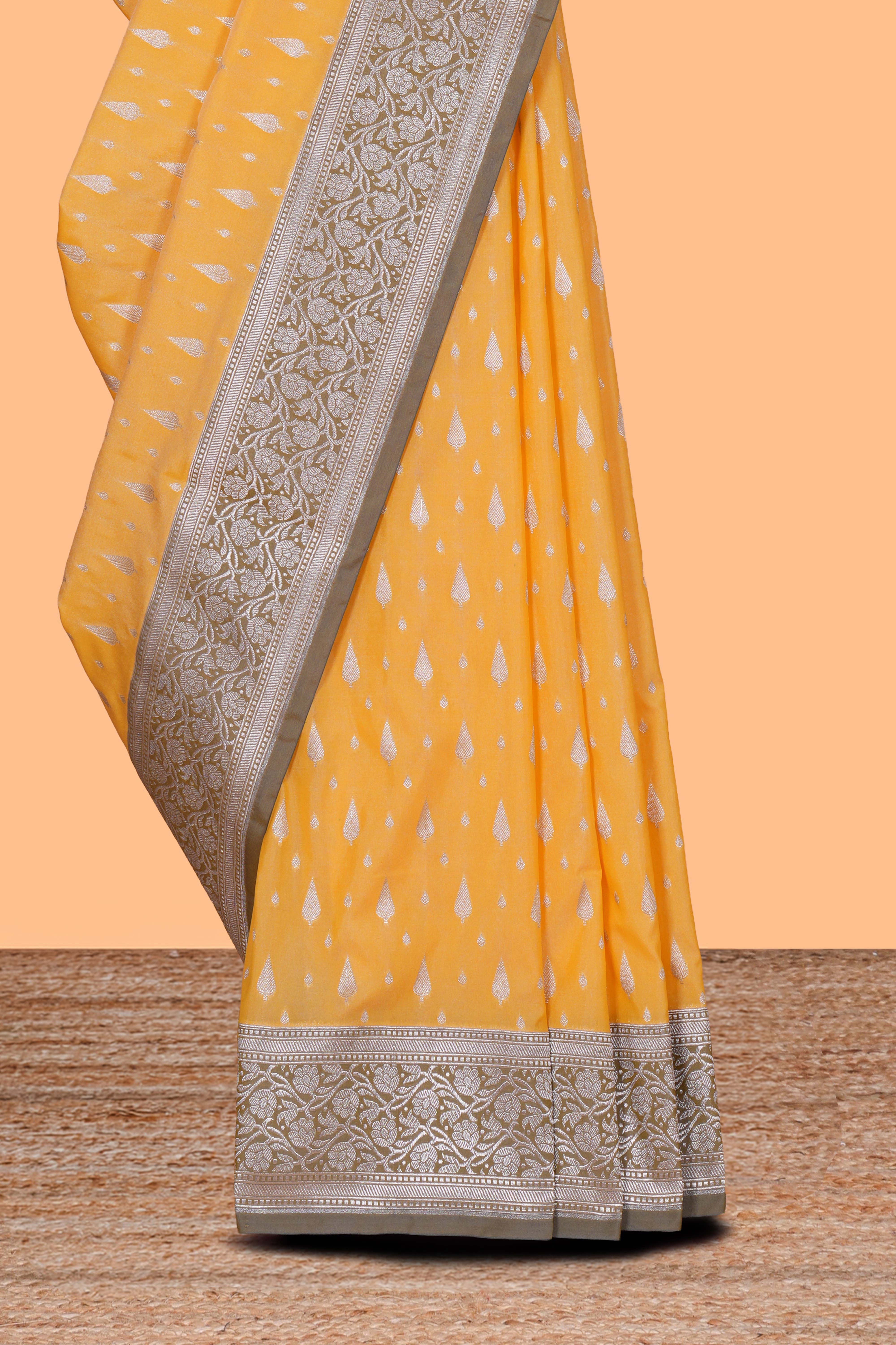 Yellow zari motifs design banarasi silk saree with contrast border and matching blouse